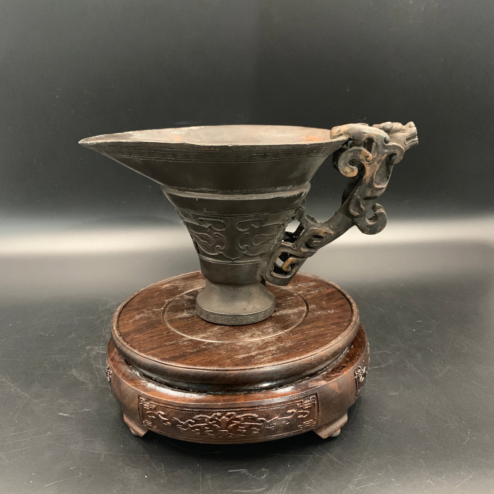 A FINE BRONZE LIBATION WINE SERVERS - 2