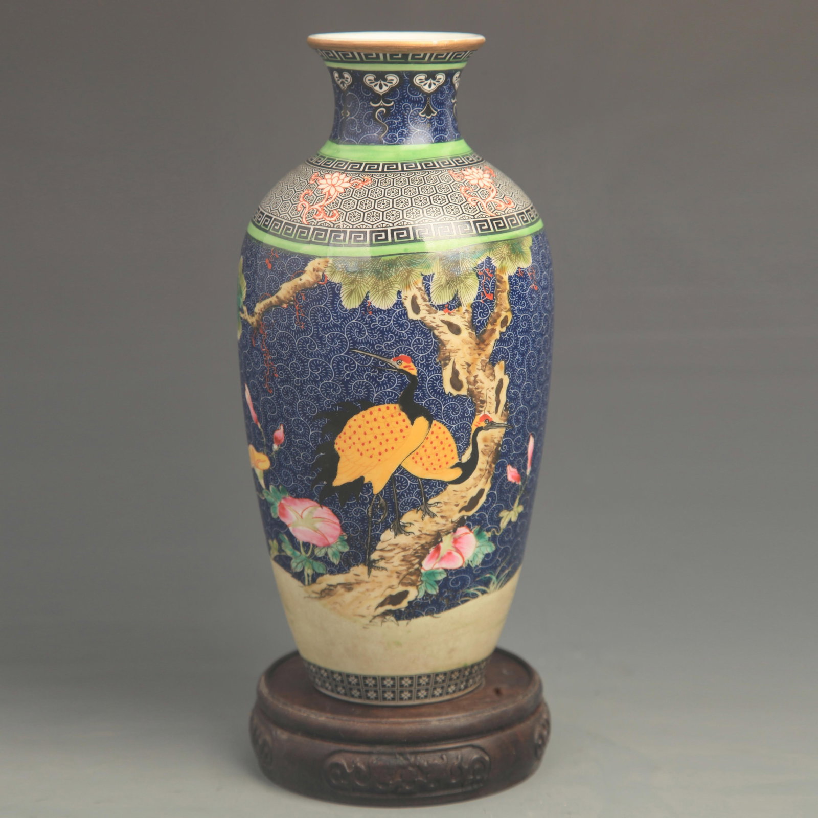 CLOISONNE COLOR BLUE GROUND FLOWER AND BIRD PATTERN PORCELAIN VASE: Qing Dynasty Yong Zheng Period; High: 8.80 inch; Diameter: 3.80 inch; . Wooden base for display only