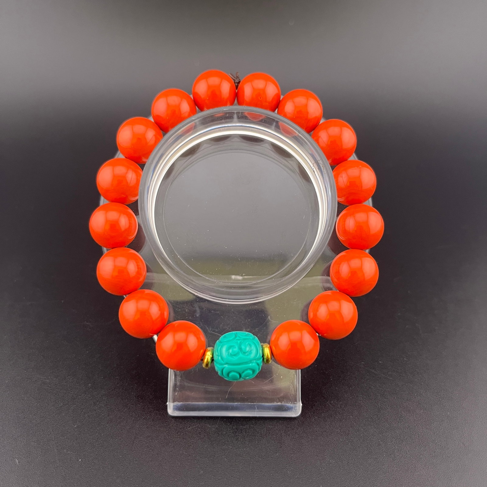 CORAL ANDTURQUOISE MADE BRACELET: Modern; Long: 4.2 inch; Diameter: 0.48 inch; . Wooden base for display only