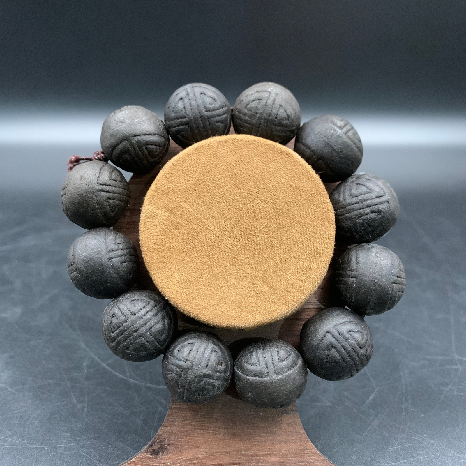 CARVED SHOU CHARACTER AGARWOOD BRACELET: Modern; Long: 3.9 inch; Diameter: 0.7 inch; . Wooden base for display only