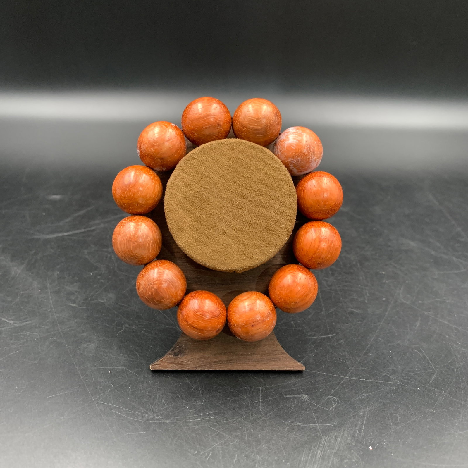 A FINE ROSEWOOD PRAYER BEADS: Modern; Long: 3.6 inch; Diameter: 0.7 inch; . Wooden base for display only