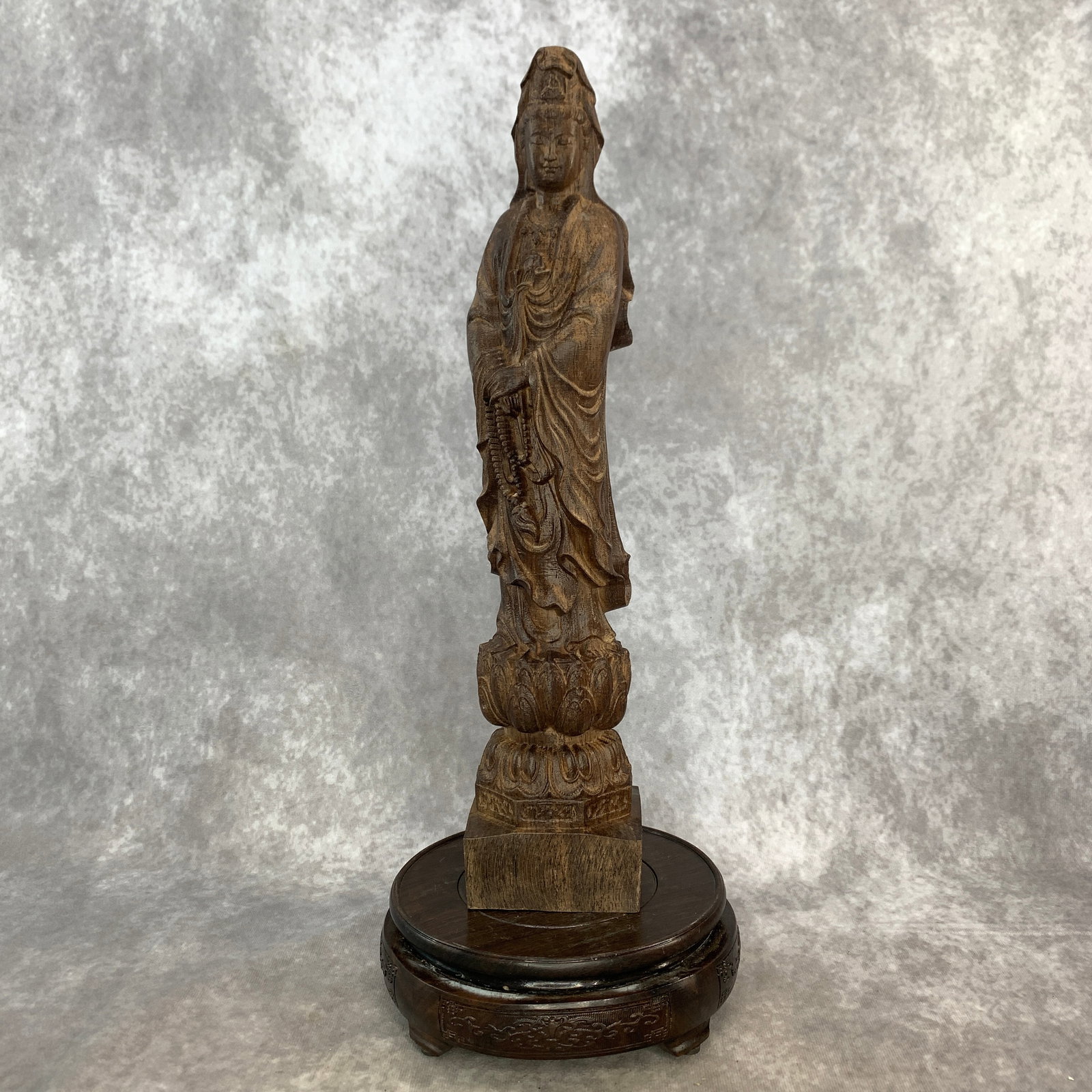 CARVED AGARWOOD FIGURE OF STANDING GUANYIN: Modern; Long: 2.9 inch; Width: 2.4 inch; High: 11 inch; . Wooden base for display only