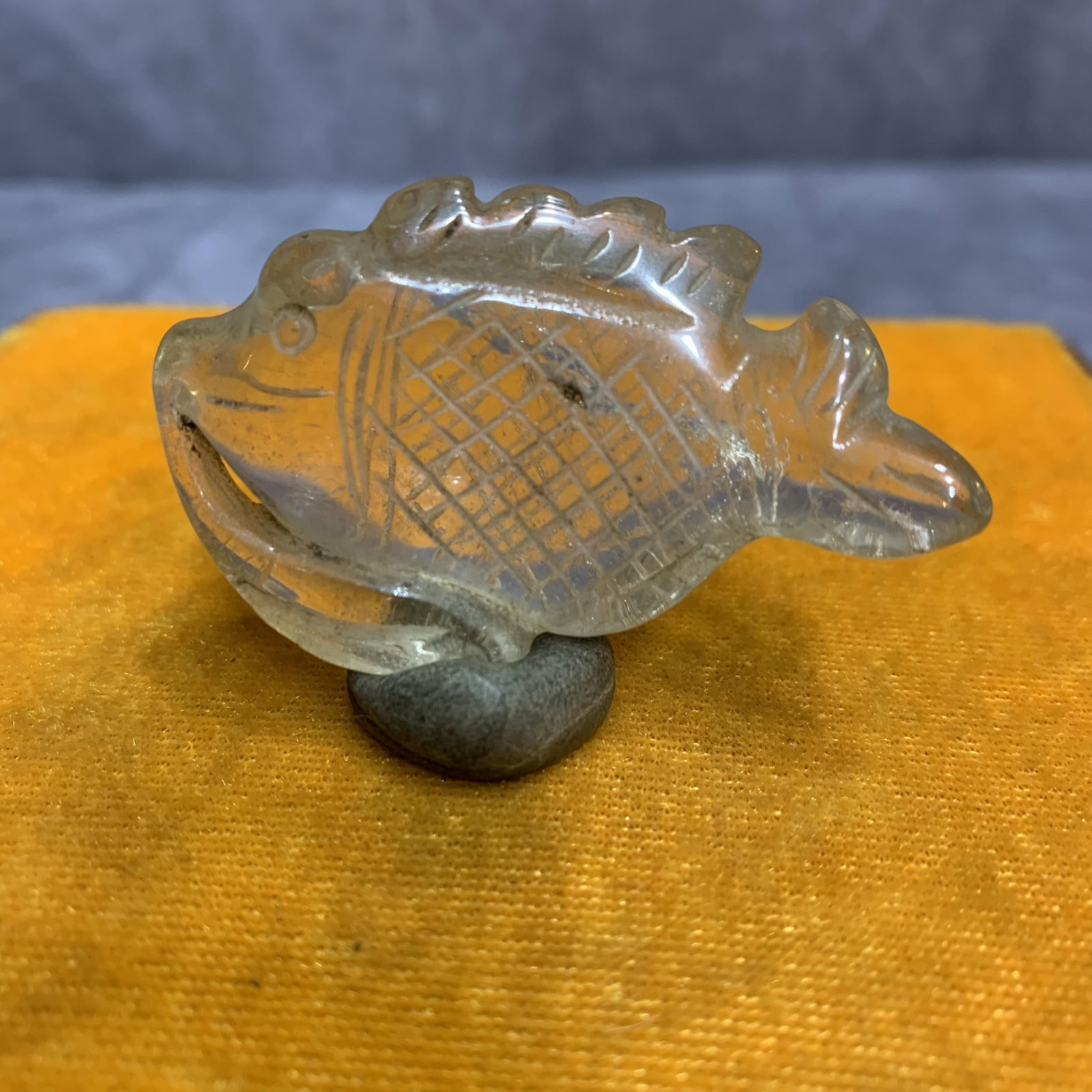 A SMALL GLASS MADE FISH FIGURE: Qing Dynasty; Long: 2.2 inch; Width: 1.3 inch; Diameter: 0.6 inch . Wooden base for display only