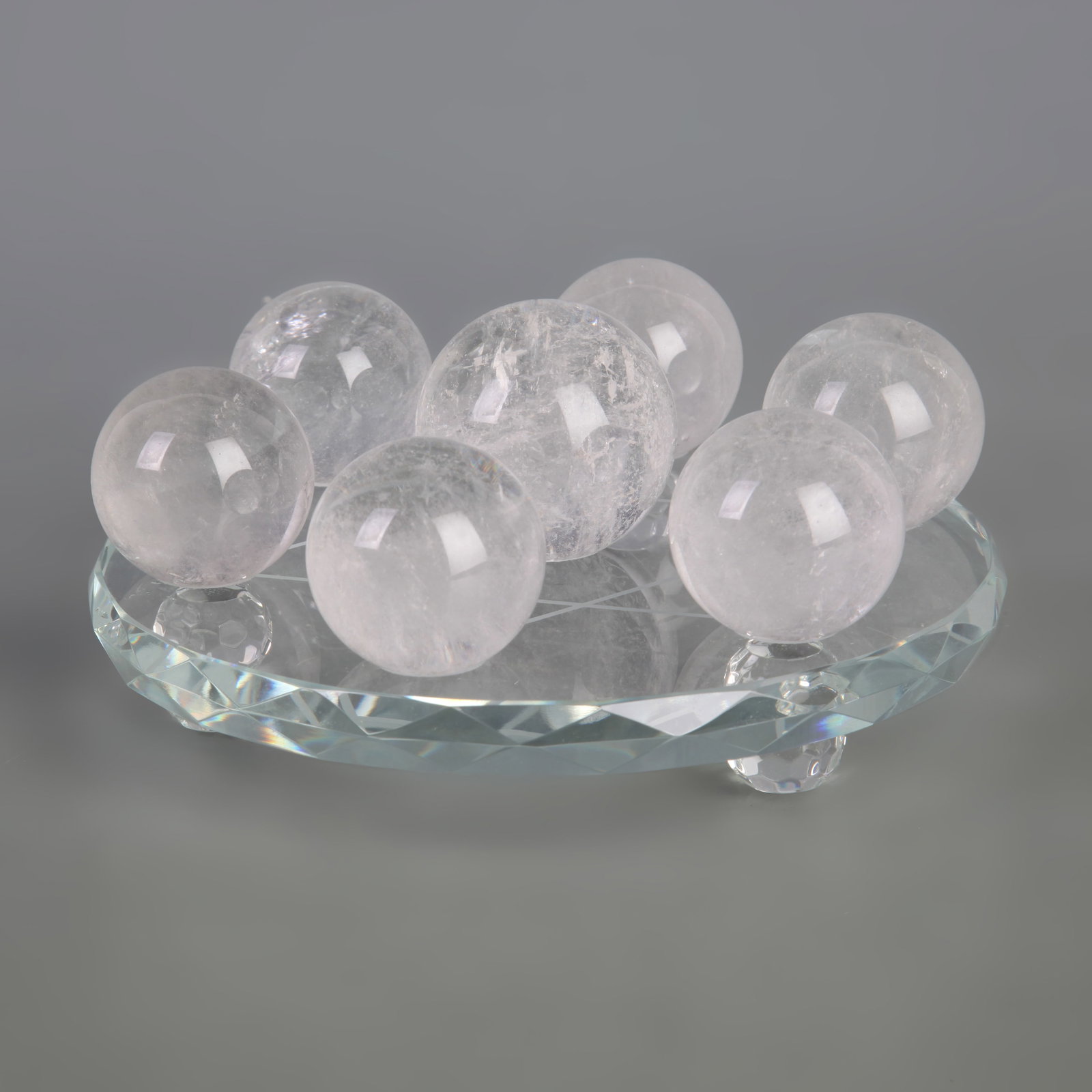 WHITE CRYSTAL SEVEN-STAR ARRAY SET: Modern; Diameter: 1.3 inch to 1.5 inch. Wooden base for display only