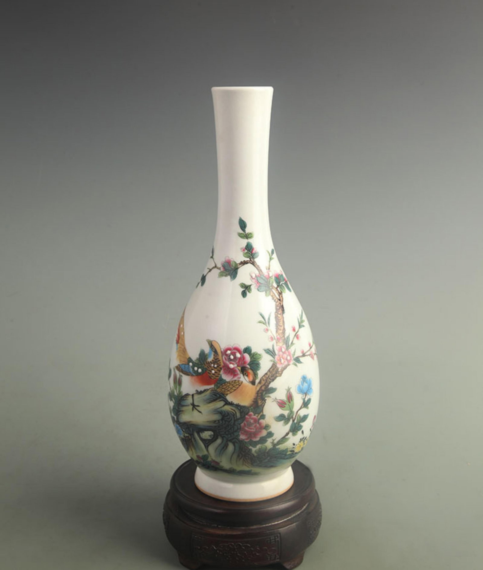 FAMILLE-ROSE PHOENIX AND FLORAL GUANYIN PORCELAIN VASE: Qing Dynasty Qian Long Period; High: 11.5 inch; Width: 4.20 inch. Wooden base for display only