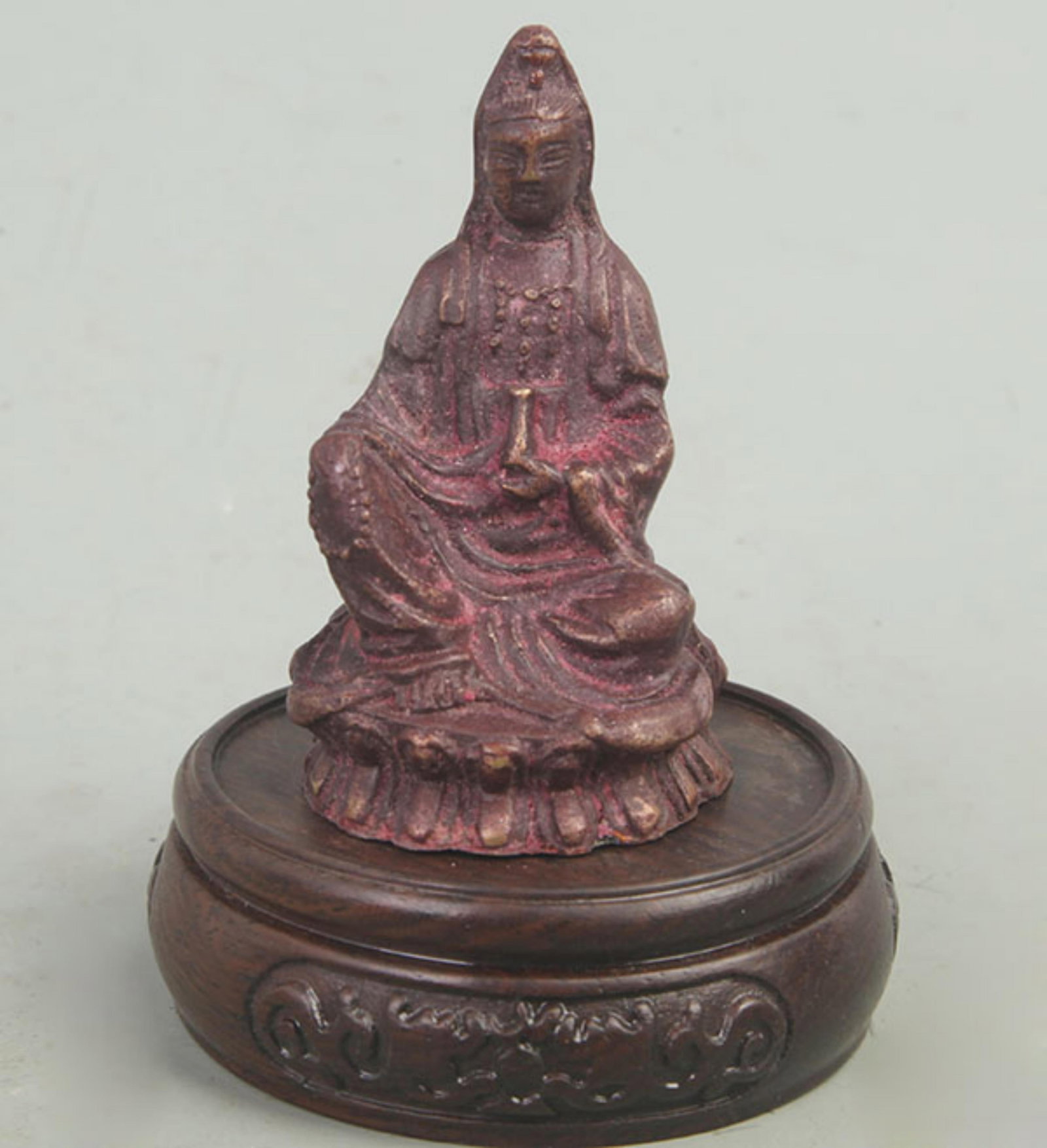 A FINE BRONZE GUANYIN STATUE: Modern; High: 9 inch; Diameter: 1.8 inch; . Wooden base for display only