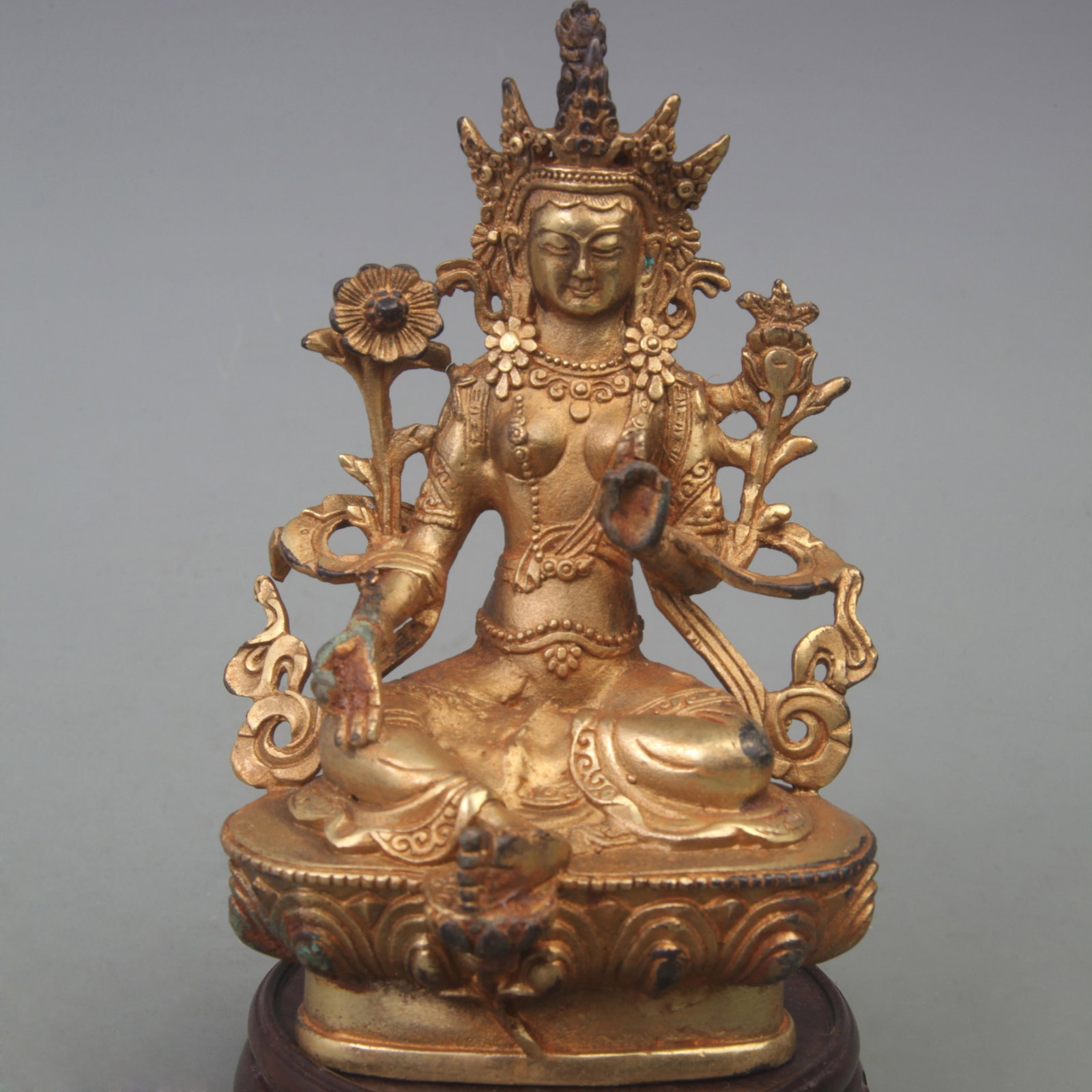 A FINE BRONZE GREEN TARA BUDDHA STATUE: Ming Dynasty Style; Diameter: 3.8 inch; High: 6 inch; . Wooden base for display only
