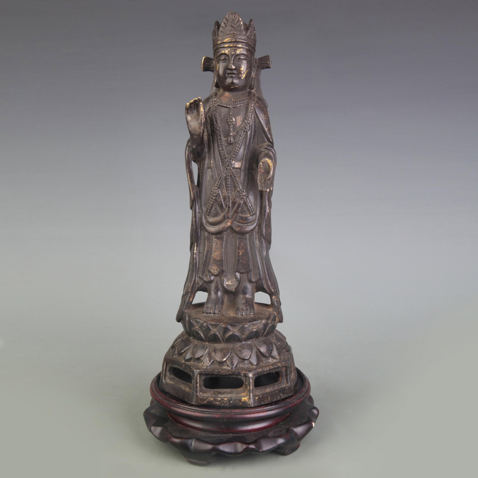 A FINE BRONZE FIGURE OF AVALOKITESHVARA GUANYIN: Qing Dynasty; High: 10.4 inch; . Wooden base for display only
