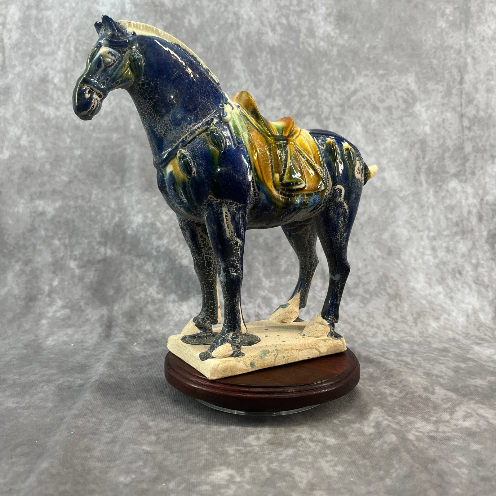 COBALT-BLUE AND GLAZED POTTERY MODEL OF A HORSE: Ming Dynasty Style; Long: 9 inch; Width: 3.1 inch; High: 8.1 inch; . Wooden base for display only
