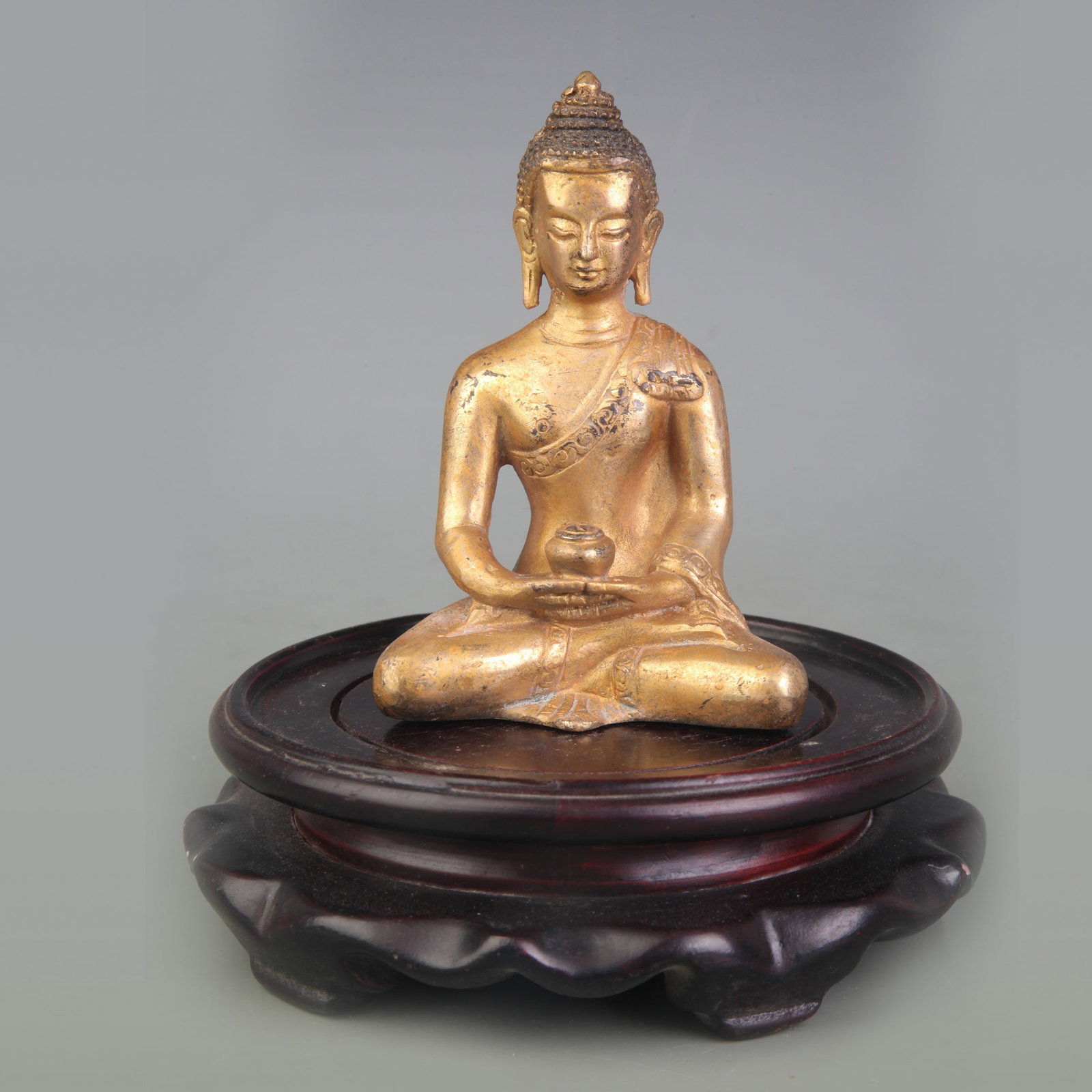 A FINE BRONZE AMITABHA BUDDHA STATUE: Qing Dynasty; High: 4.0 inch. Wooden base for display only