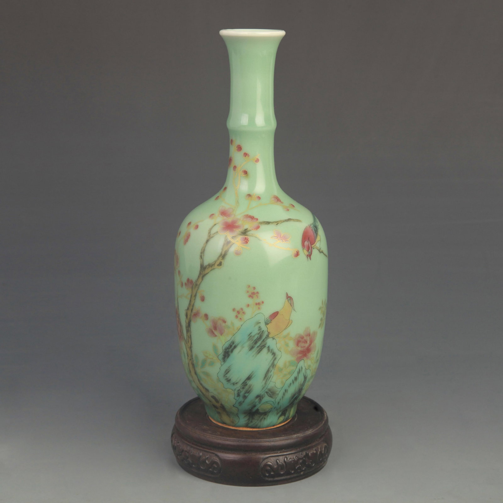 A FAMILLE ROSE BLUE-GROUND PHOENIX MOTIF LONG-NECK VASE