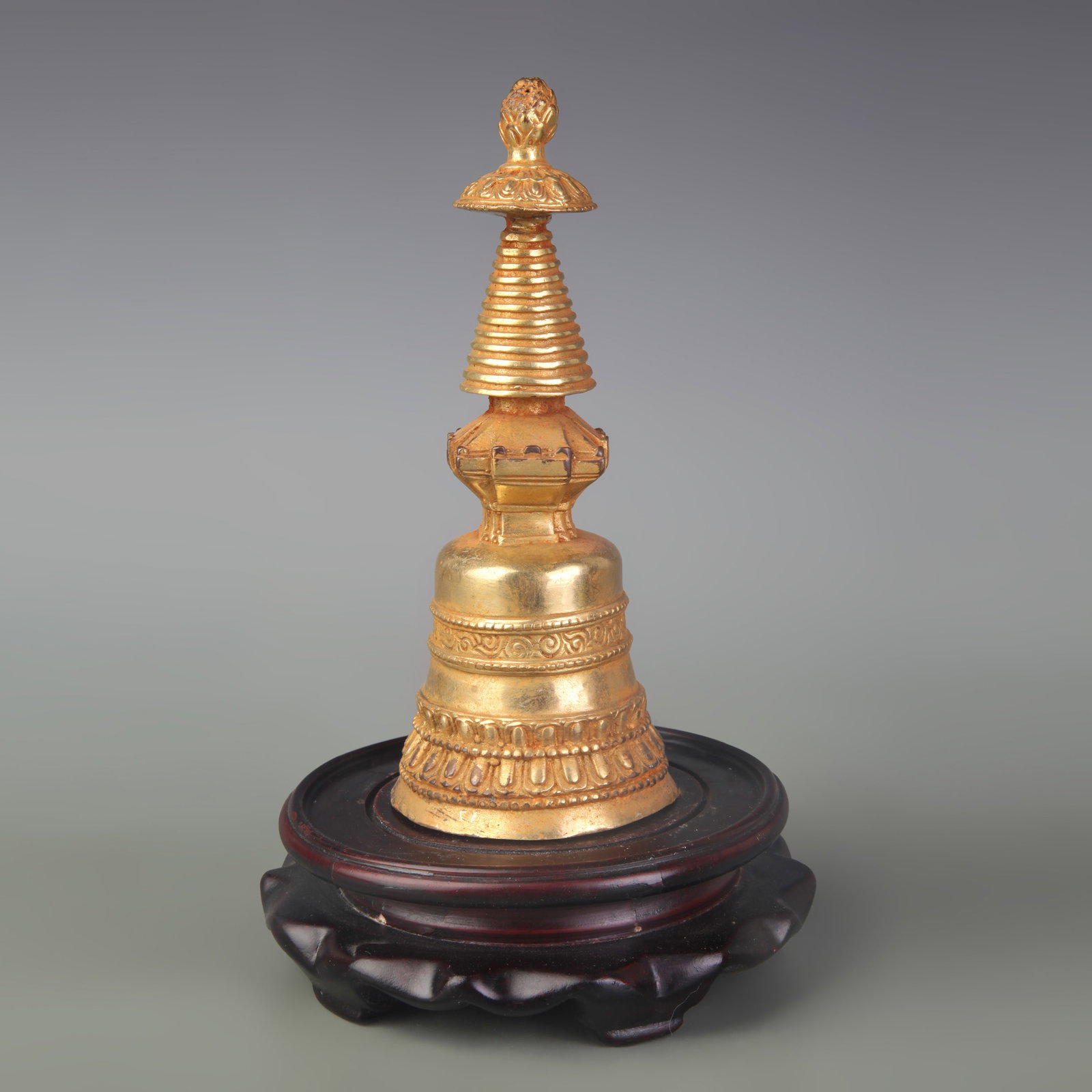 A GILT-BRONZE BUDDHIST RELIQUARY STUPA