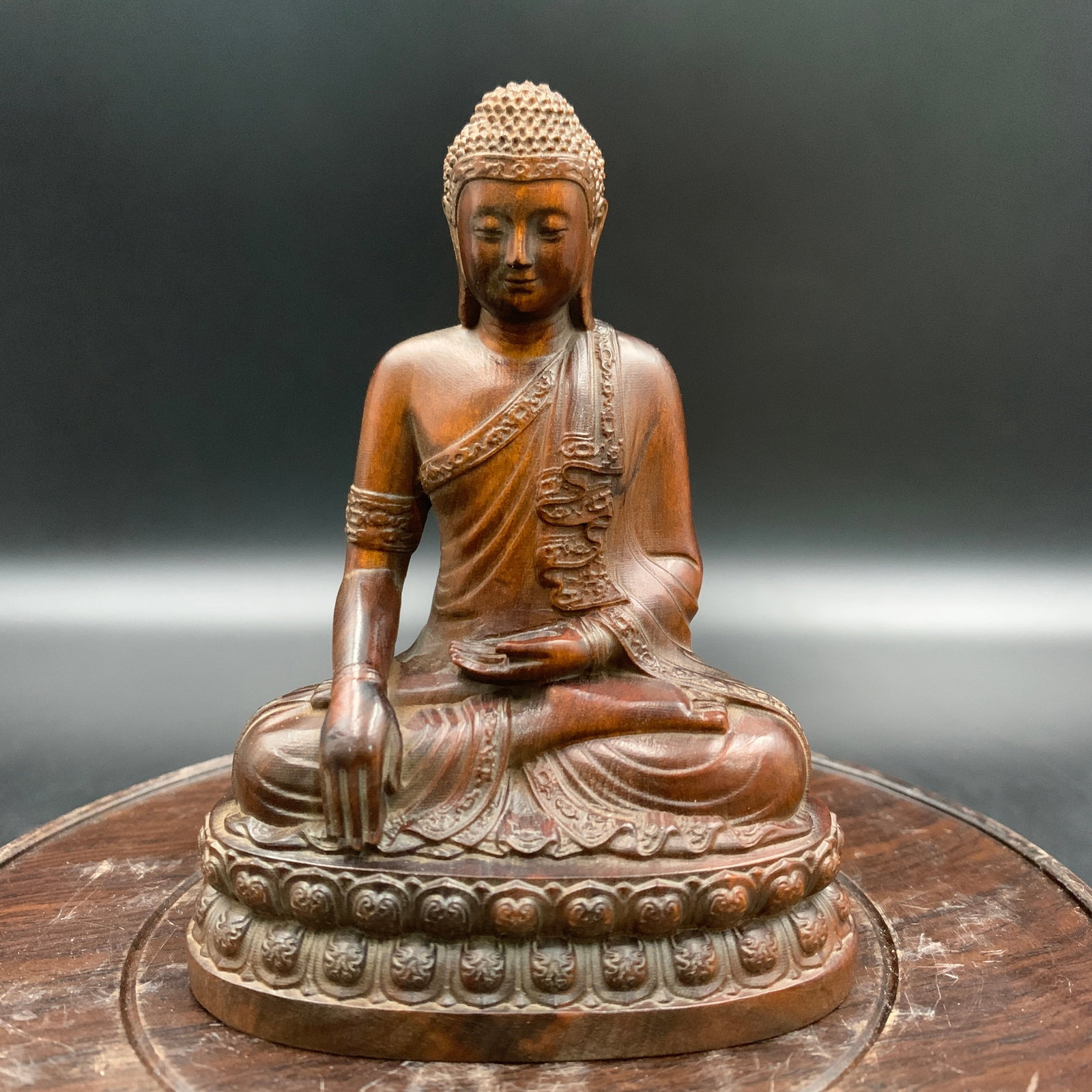 CARVED HARDWOOD SEATED SHAKYAMUNI BUDDHA