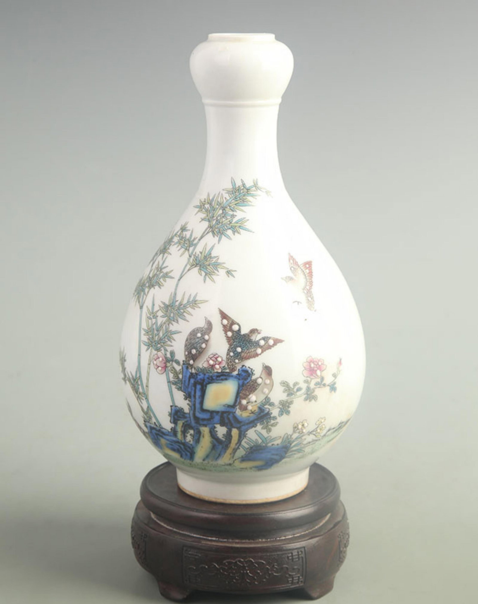 FAMILLE-ROSE QUAIL GARLIC-MOUTH VASE: Qing Dynasty Qian Long Period; High: 9.50 inch; Width: 5.00 inch. Wooden base for display only