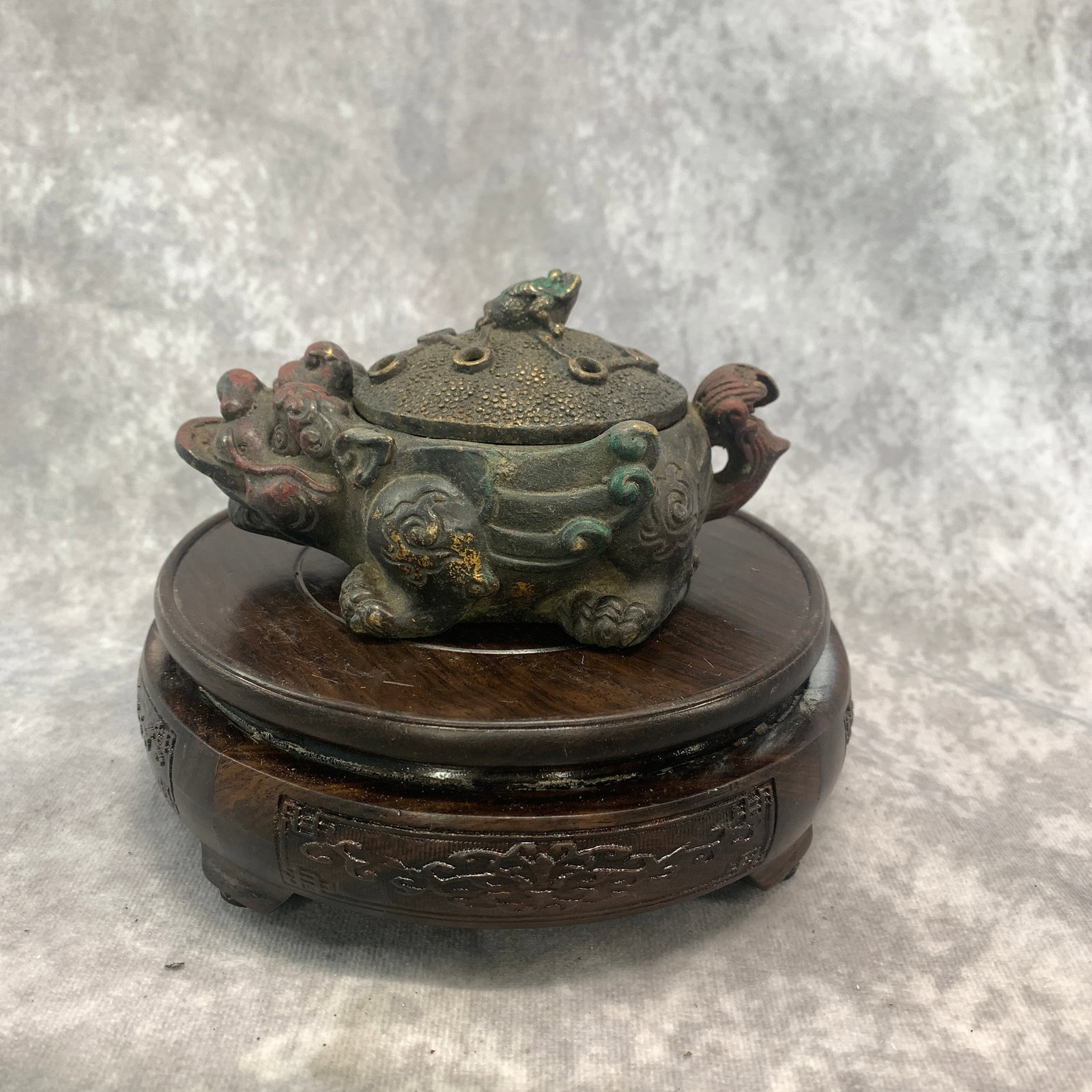 A FINE BRONZE ANIMAL-FORM CENSER AND LID