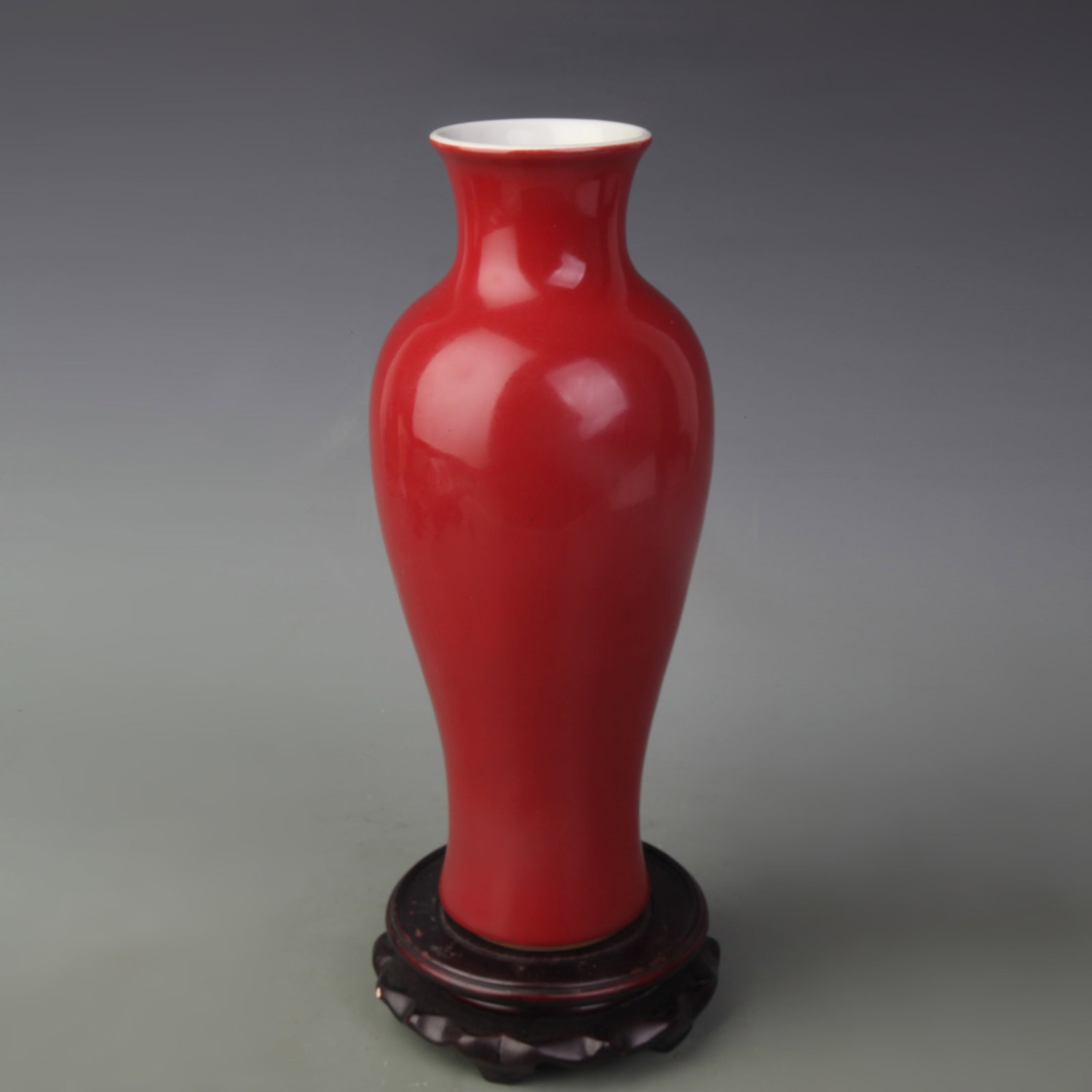 RED COLOR GLAZE YU HU CHUN STYLE PORCELAIN VASE: Qing Dynasty Qian Long Period; High: 11.2 inch. Wooden base for display only