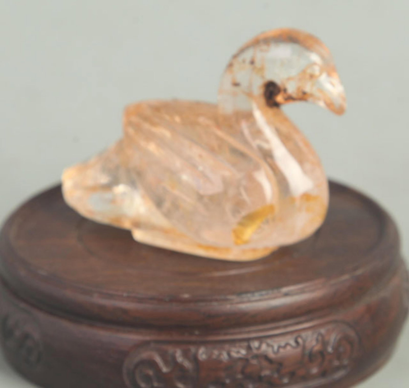A FINE CRYSTAL CARVED DUCK PAPERWEIGHT: 20th Century; High: 2.25 inch; Width: 2.75 inch; . Wooden base for display only