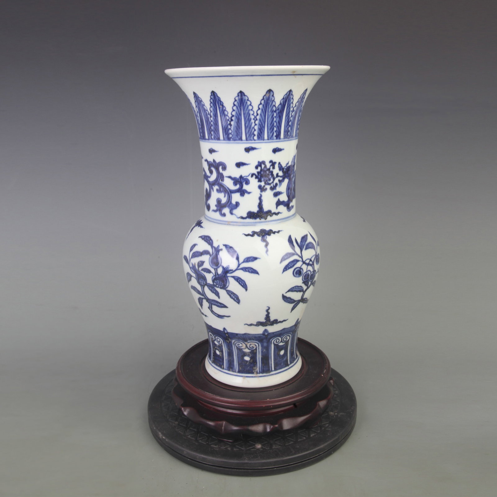 BLUE AND WHITE PORCELAIN VASE WITH FLORAL AND BIRD MOTIFS: Ming Dynasty Style; Diameter: 7.0 inch; High: 13.7 inch; . Wooden base for display only