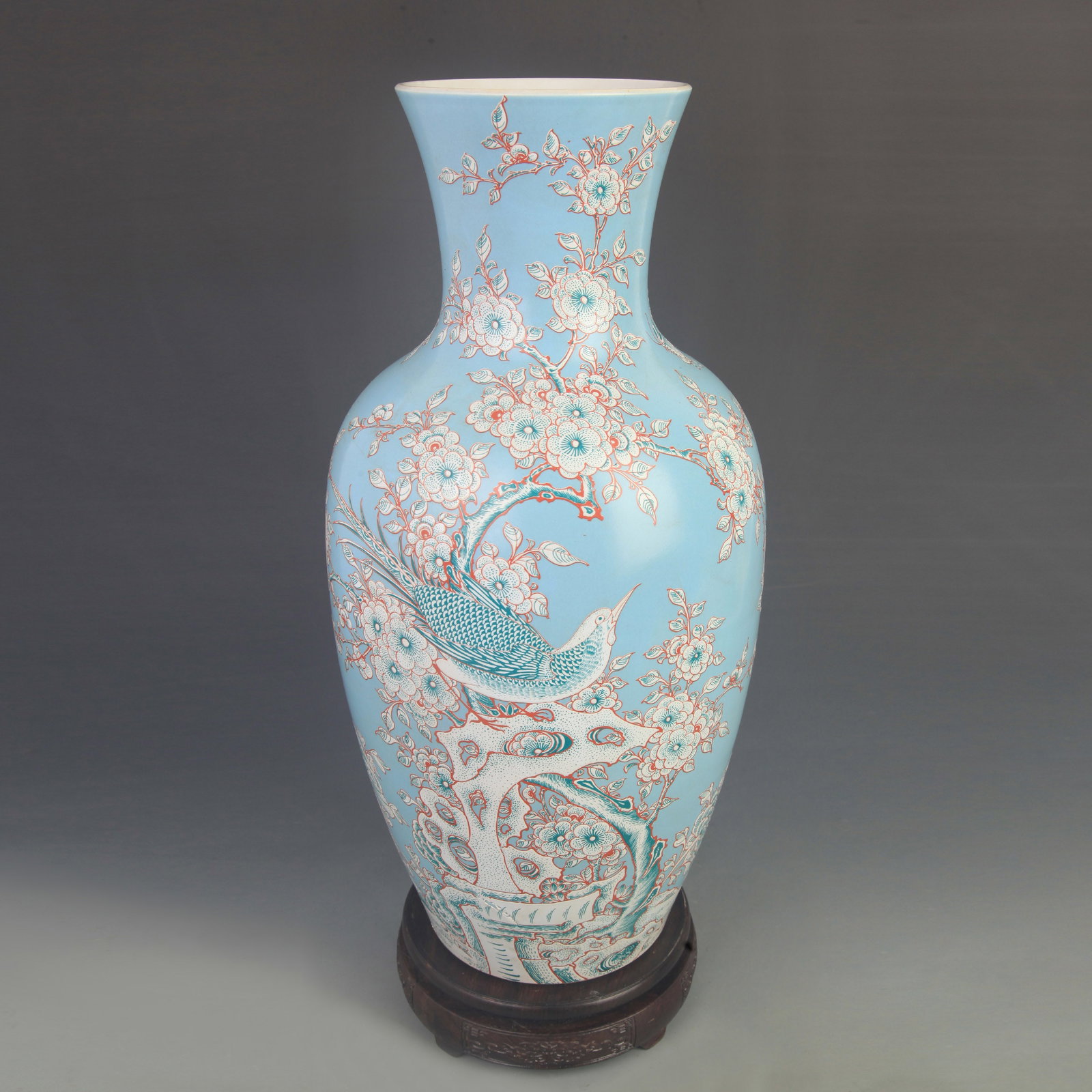 A LARGE FAMILLE ROSE LIGHT GREEN GROUND FLORAL AND BIRD PATTERN VASE: Qing Dynasty Kang Xi Period; High: 16.8 inch; Diameter: 7.10 inch; . Wooden base for display only