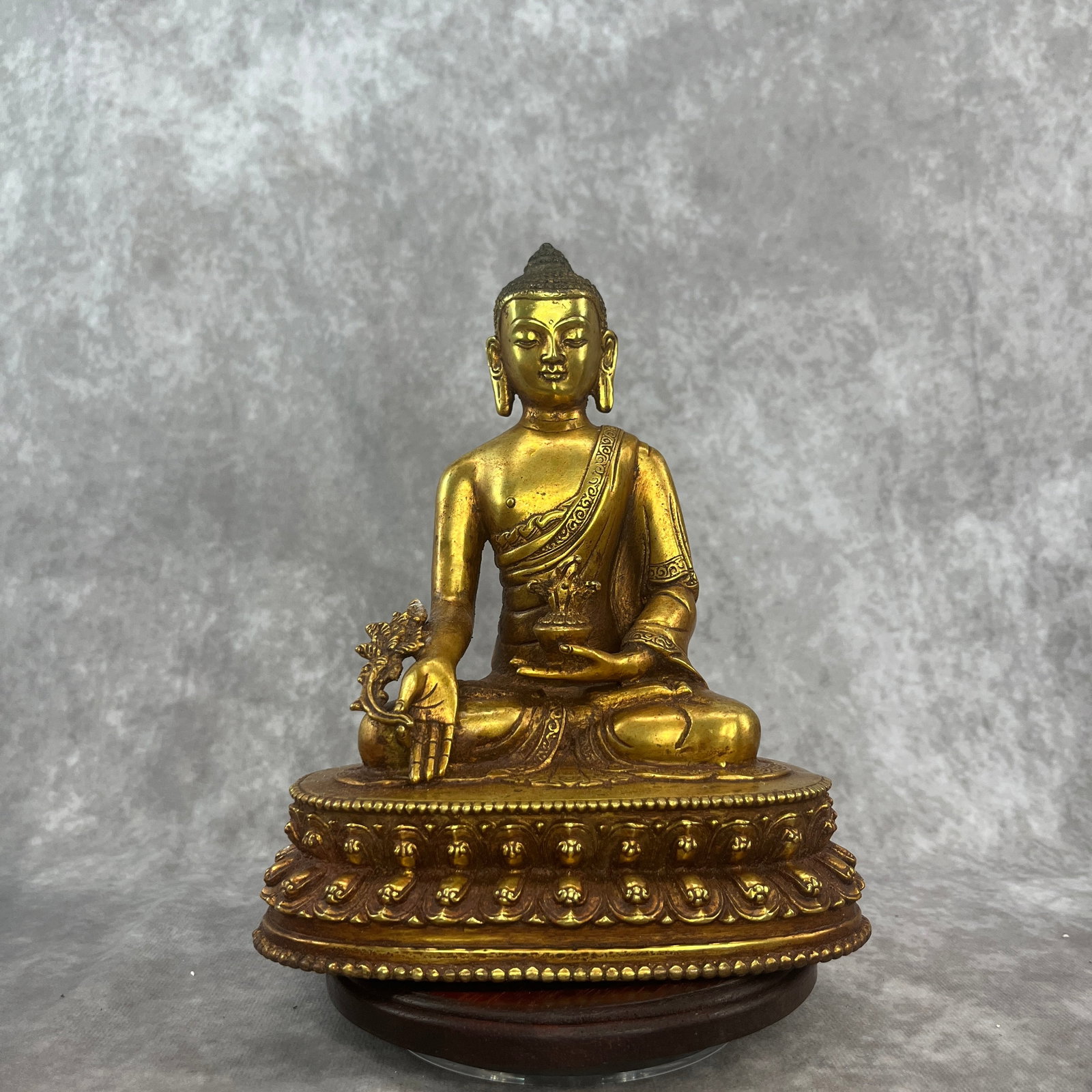 TIBETAN GILT BRONZE STATUE OF THE MEDICINE BUDDHA