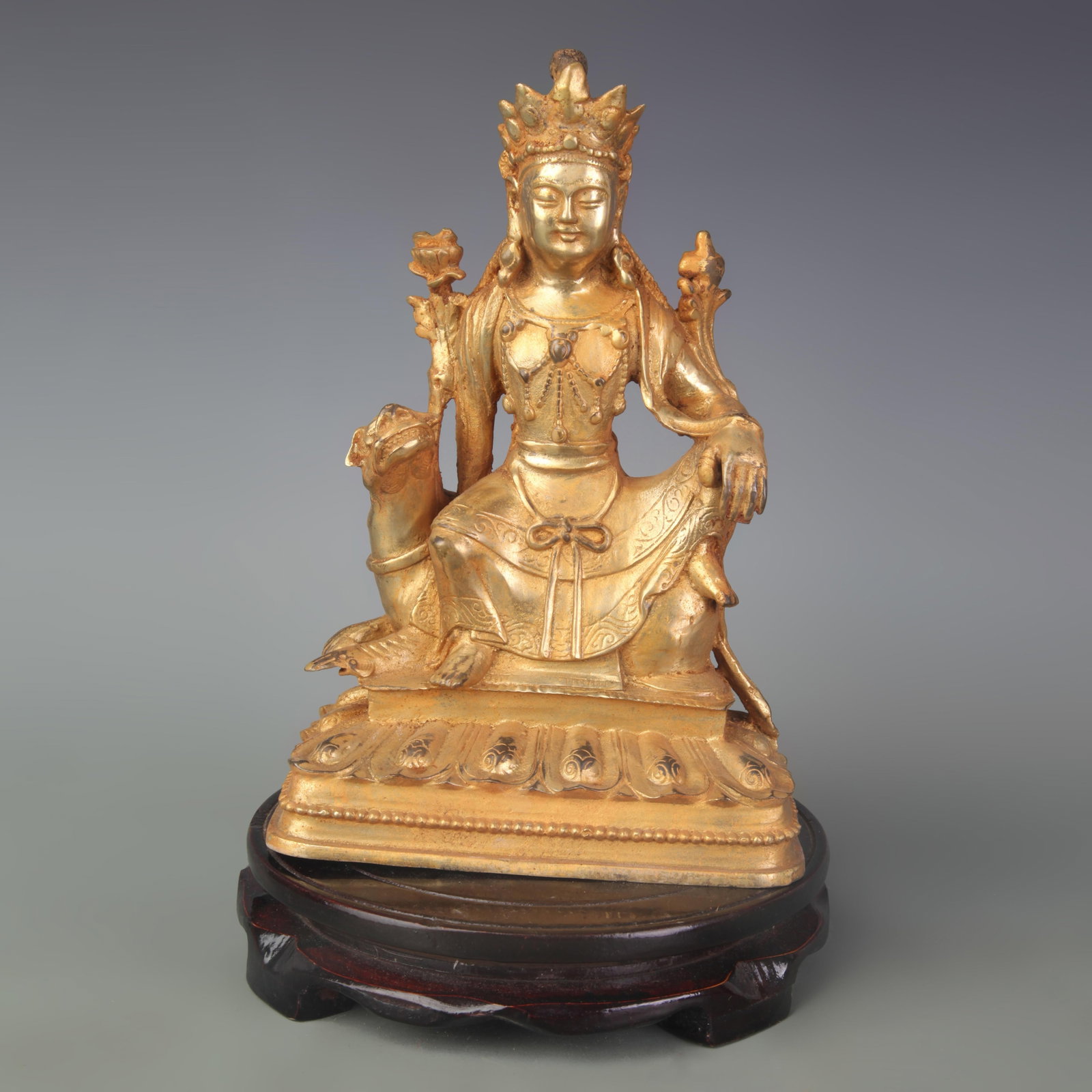 A FINE HEAVY GILT BRONZE MANJUSHRI BUDDHA FIGURE: Qing Dynasty; Width: 6.0 inch; High: 8.8 inch; . Wooden base for display only