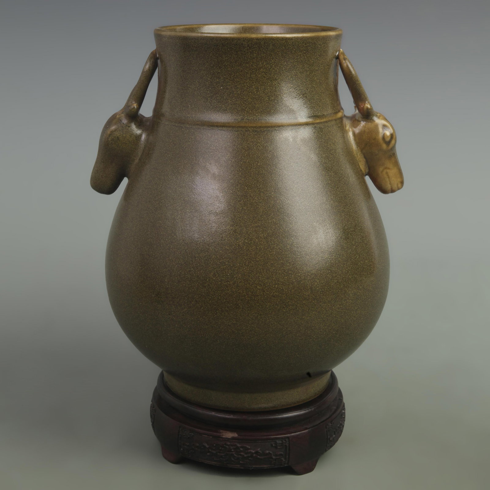 TEA DUST GLAZED DEER-HEAD PORCELAIN VASE WITH DOUBLE HANDLES: Qing Dynasty Yong Zheng Period: High: 10.2 inch; Width: 5 inch;. Wooden base for display only