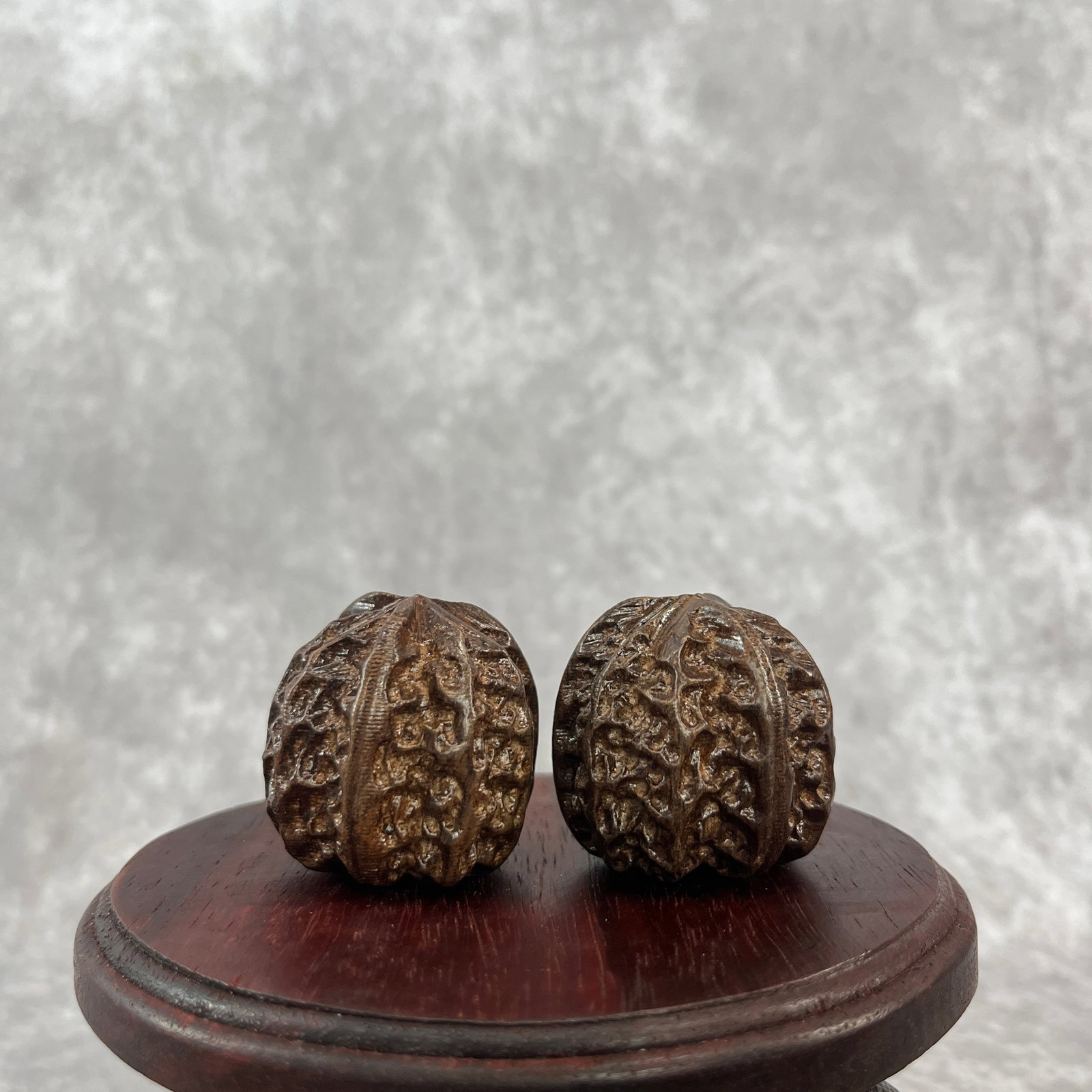 PAIR OF CHINESE SCHOLAR'S PLAYING WALNUTS, WENWAN HETAO: Modern; Long: 1.62 inch; Width: 1.6 inch; . Wooden base for display only