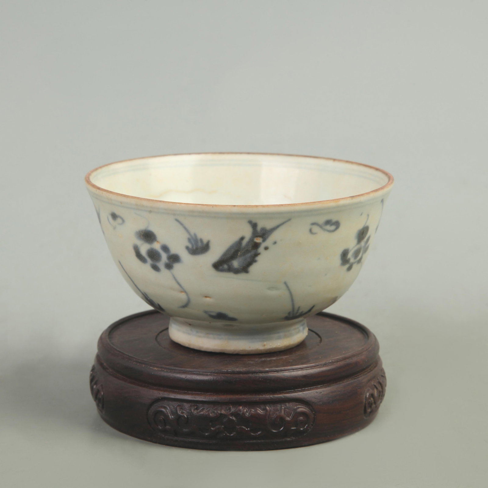 BLUE AND WHITE FLOWER SMALL PORCELAIN BOWL: Ming Dynasty Style; High: 2.4 inch; Diameter: 4.3 inch; . Wooden base for display only