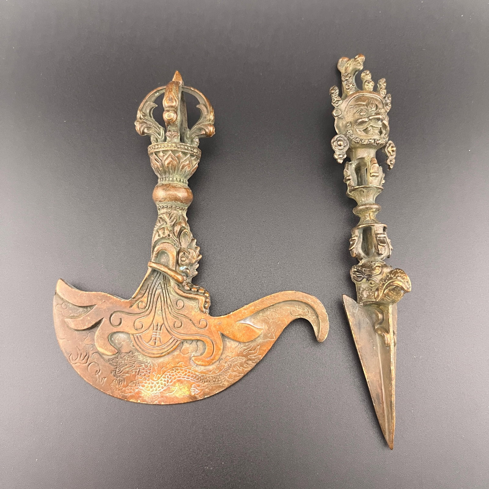 TIBETAN RITUAL BRONZE KARTIKA (FLAYING KNIFE) & PHURBA (DAGGER) PAIR: Qing Dynasty; Width: 3.9 inch; High: 4.9 inch; Long: 6.1 inch; Width: 1.1 inch; . Wooden base for display only