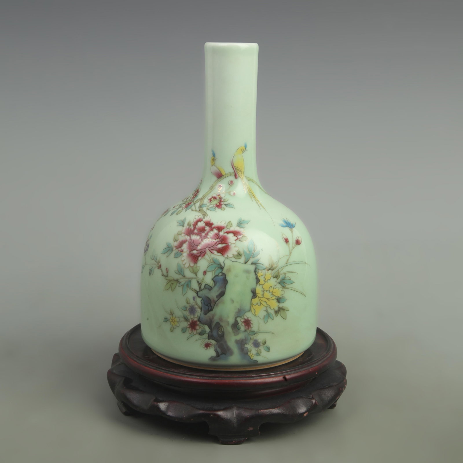 BEAN GREEN GROUND BELL-SHAPED VASE WITH BIRD AND FLOWERS: Qing Dynasty; Qianlong Period; High: 9 inch; Width: 5 inch; . Wooden base for display only