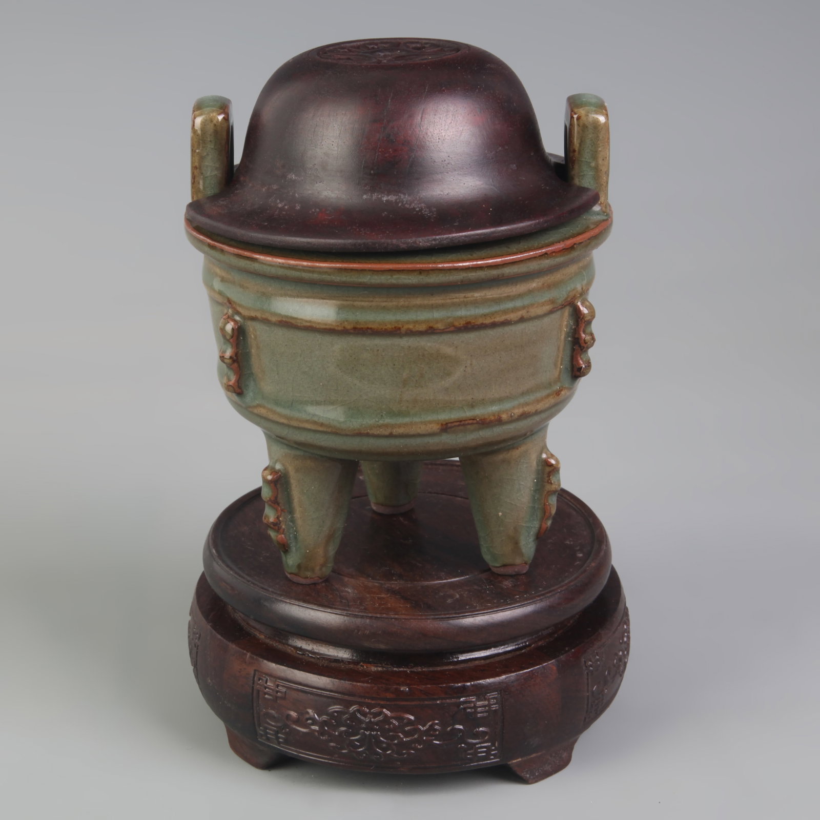 LONGQUAN KILN TRIPOD CENSER WITH WOOD LID AND HIGH FEET: Ming Dynasty Style; High: 4.9 inch; Diameter: 3.9 inch; . Wooden base for display only