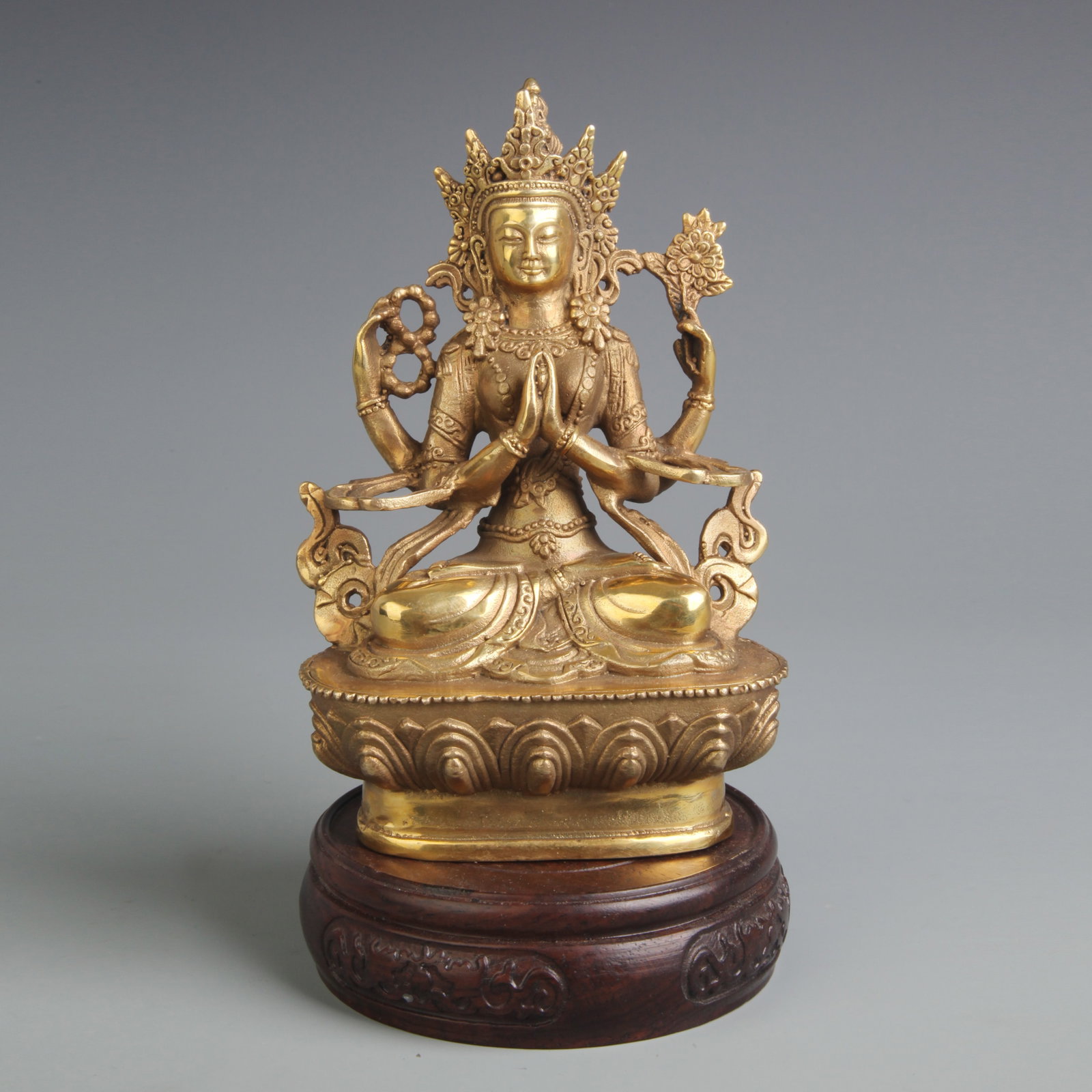 GILT-BRONZE FOUR-ARMED AVALOKITESHVARA BODHISATTVA: 20th Century;High: 6.00 inch;Width: 3.80 inch. Wooden base for display only