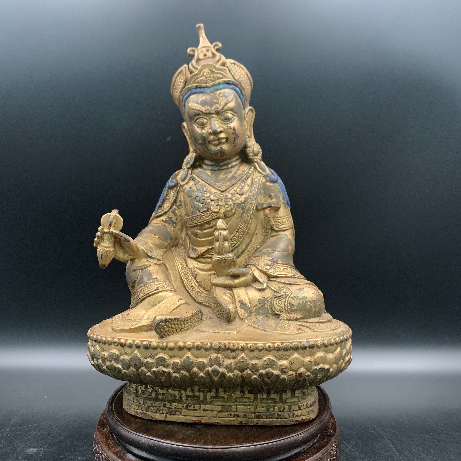 RARE GILT BRONZE PADMASAMBHAVA STATUE (GURU RINPOCHE): Qing Dynasty; Long: 6.9 inch; Width: 4.8 inch; High: 10.8 inch; . Wooden base for display only