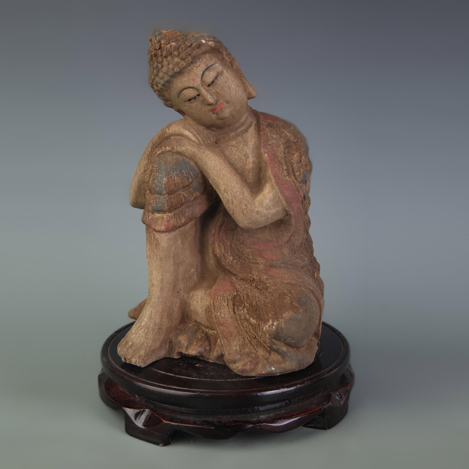 A PAINTED WOOD RECLINING BUDDHA FIGURE: Republic Period; High: 17.3 inch. Wooden base for display only