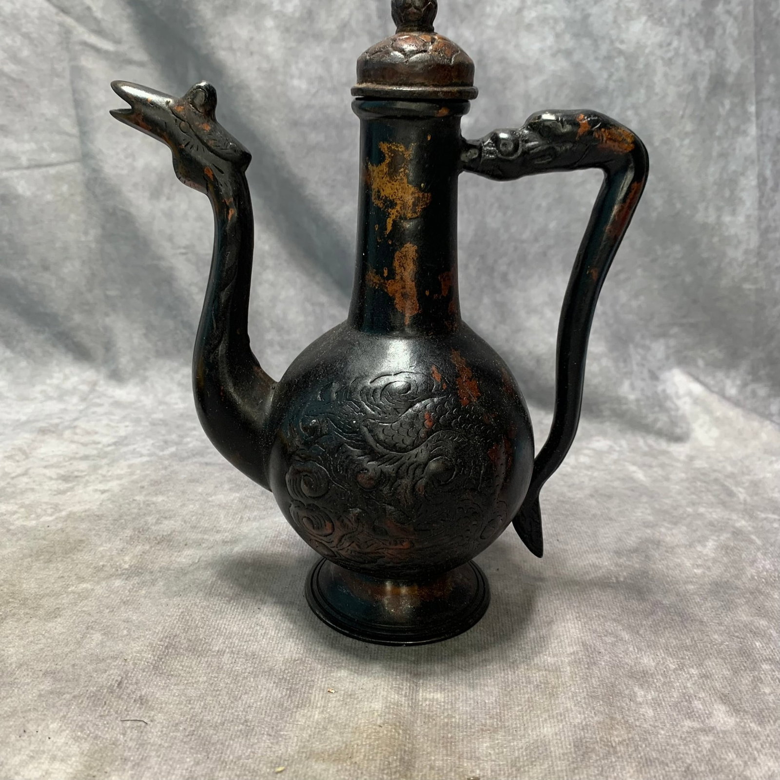 A BRONZE EWER WITH CHICKEN-HEAD SPOUT AND DRAGON MOTIF (1 of 5)