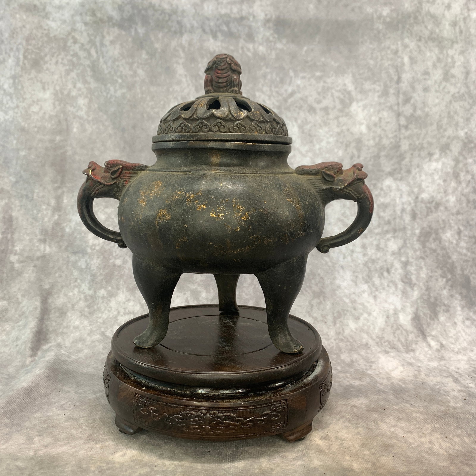 GOLD-SPLASHED BRONZE TRIPOD CENSER WITH ELEPHANT HANDLES