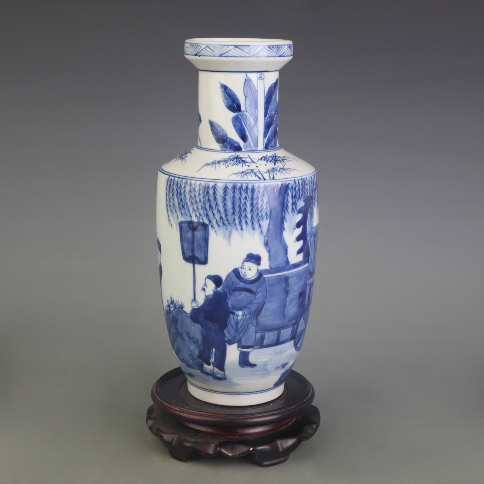 BLUE-AND-WHITE FIGURE PORCELAIN ROULEAU VASE: Qing Dynasty Kang Xi Period D: 3.0in ; High: 10.0in. Wooden base for display only