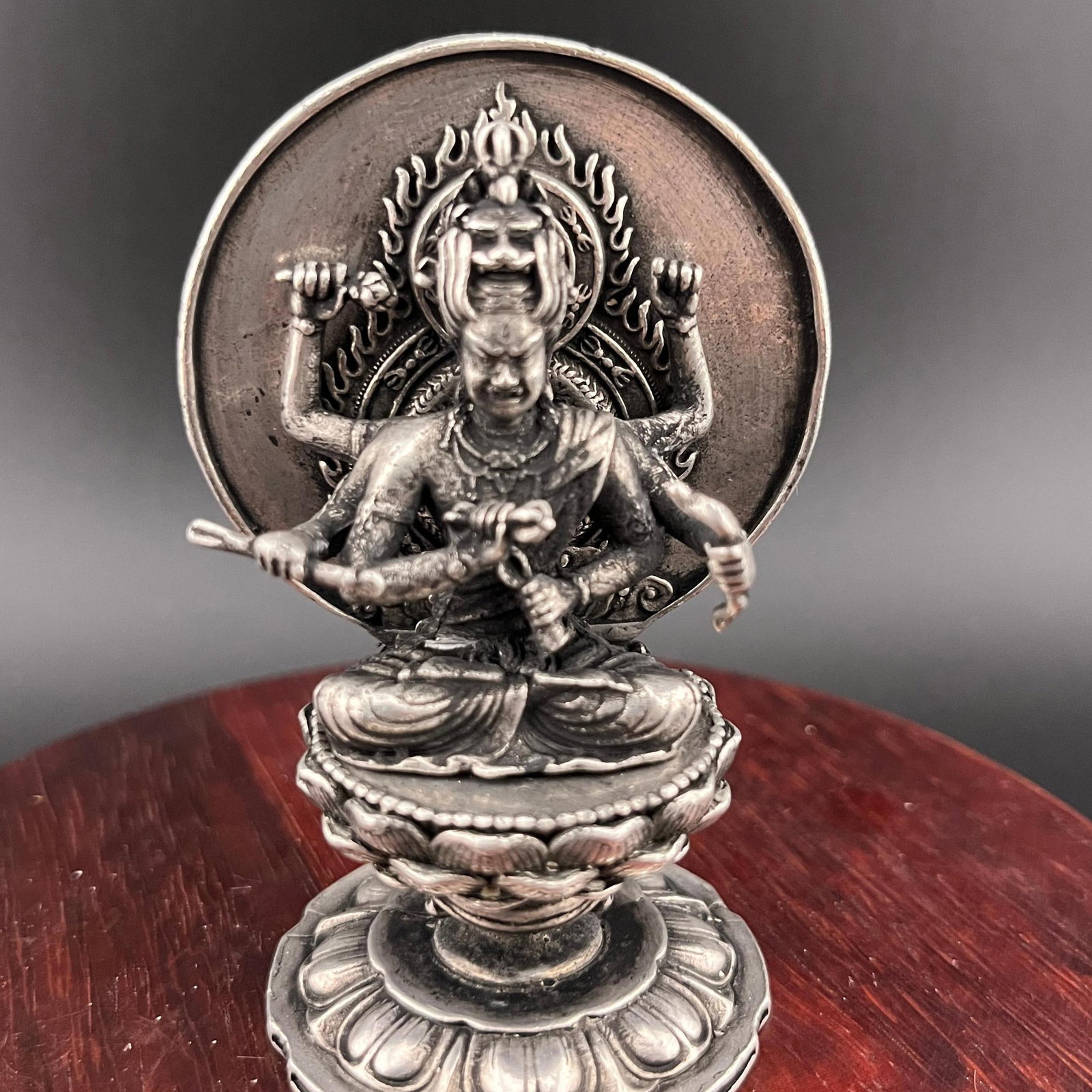 A SMALL WHITE BRONZE THOUSAND HAND GUAN YIN STATUE: Modern; Long: 1.9 inch; Width: 1.6 inch; High: 2.9 inch; Wooden base for diplay only