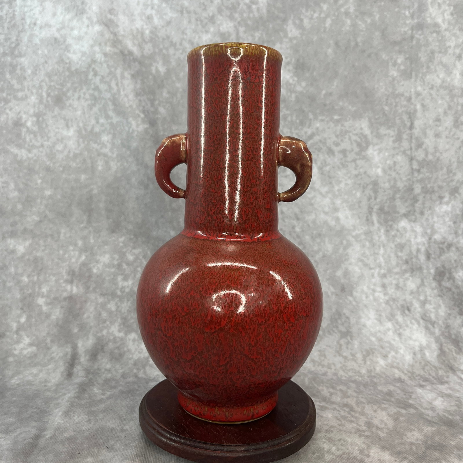 A FINE SACRIFICIAL-RED GLAZED ELEPHANT-EAR BOTTLE PORCELAIN VASE