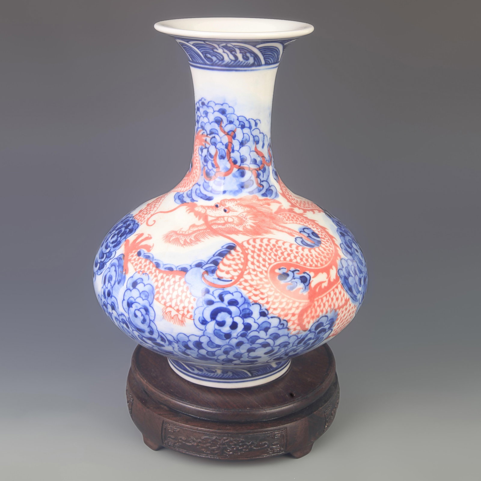 BLUE AND WHITE UNDERGLAZE RED DRAGON PATTERN PORCELAIN VASE: Qing Dynasty Yong Zheng Period; High: 10.02 inch; Diameter: 8.00 inch; Wooden base for diplay only