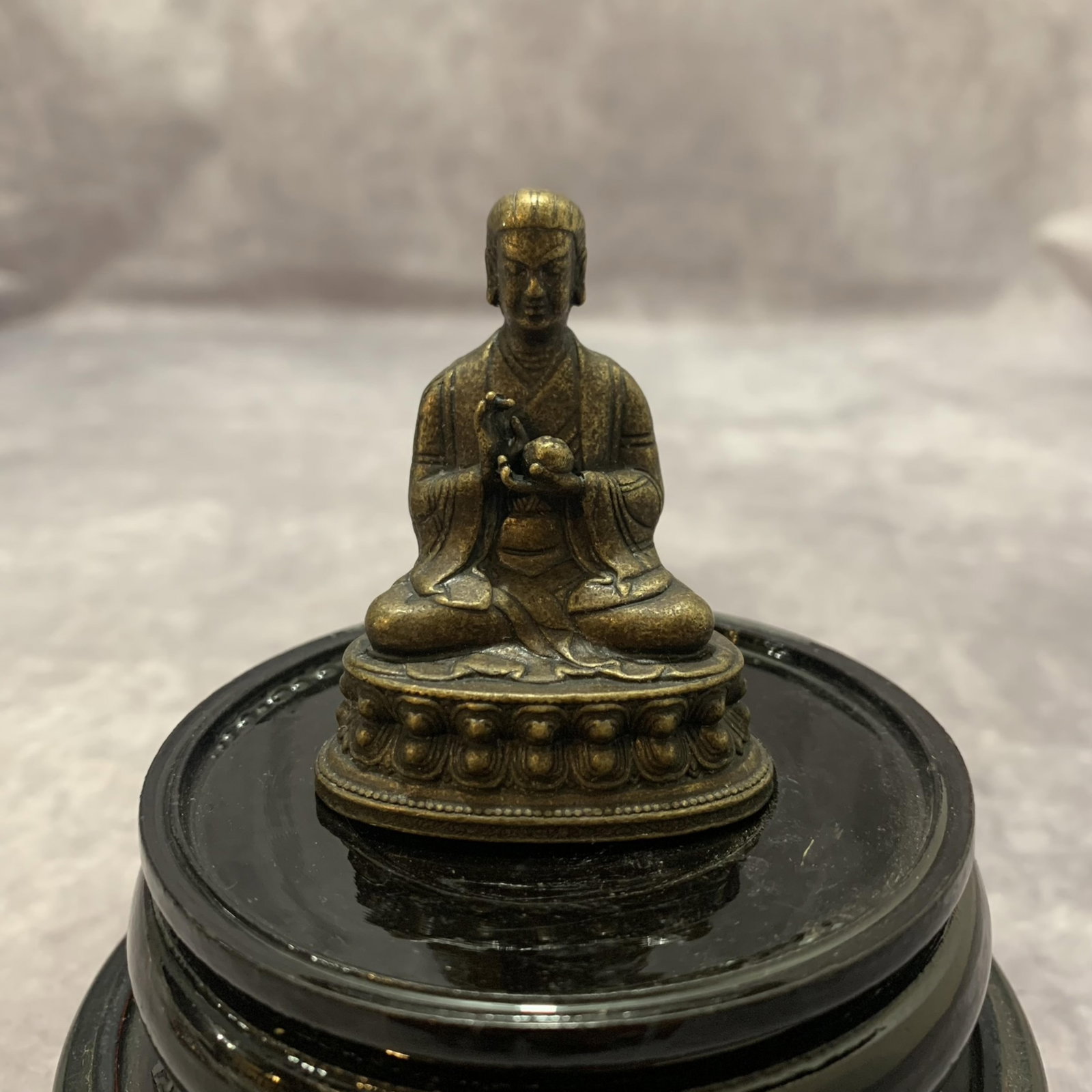 A FINE SMALL TIBETAN BUDDHIST STATUES: Qing Dynasty; Long: 2.2 inch; Width: 1.2 inch; High: 1.7 inch; Wooden base for diplay only