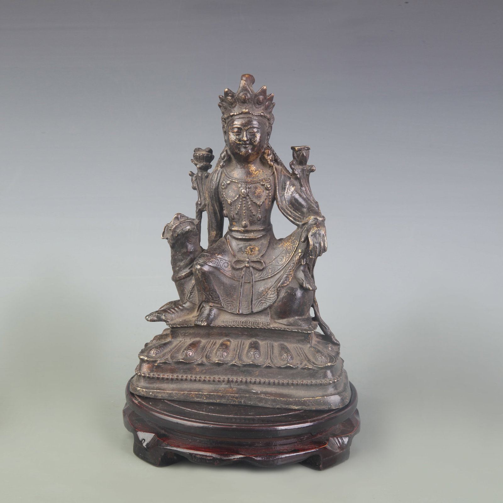 CAST IRON SEATED GUANYIN FIGURE ON MYTHICAL BEAD: Qing Dynasty; Width: 6.1 inch; High: 8.8 inch; Wooden base for diplay only