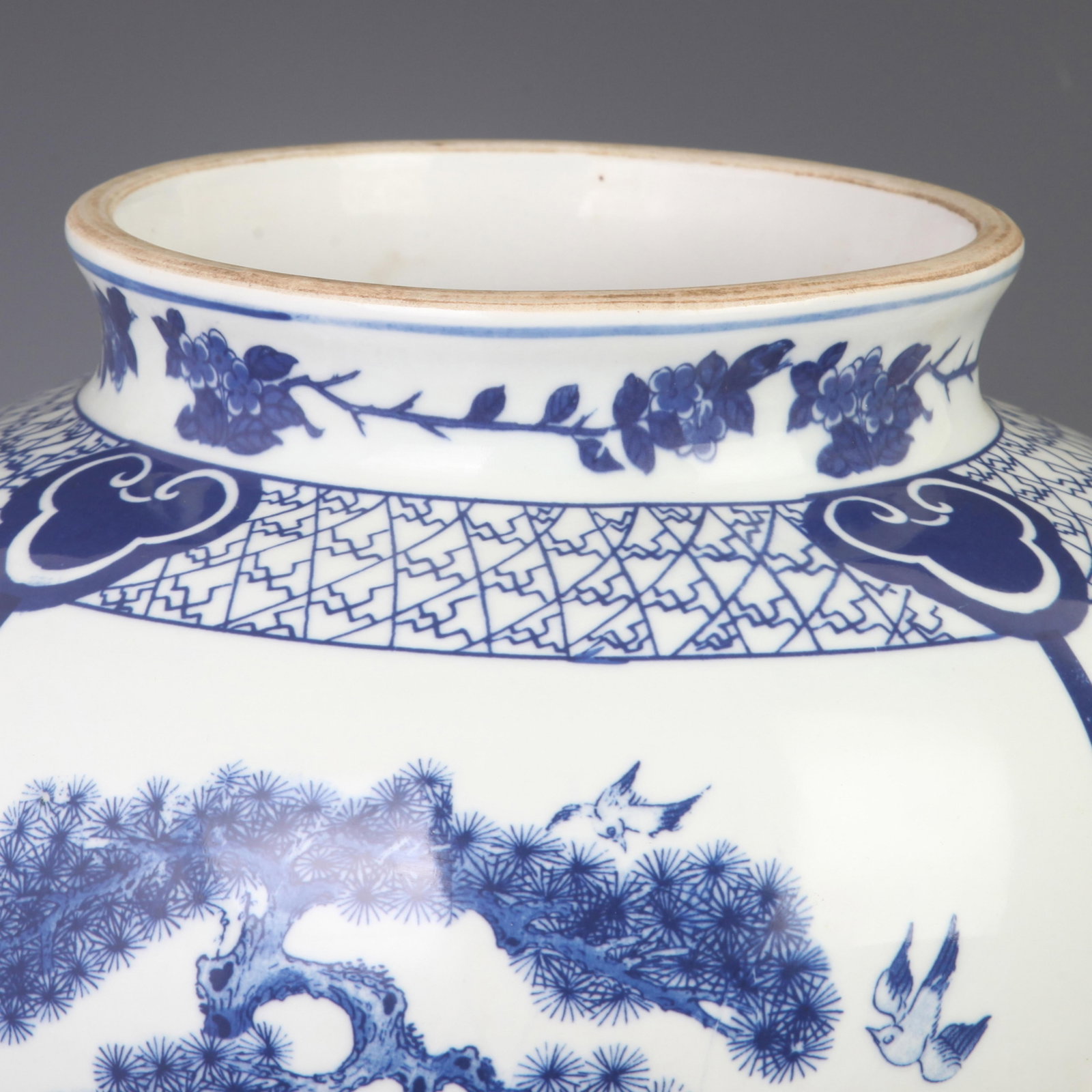 BLUE AND WHITE FLOWER AND BIRD PATTERN GENERAL STYLE PORCELAIN JAR: Qing Dynasty Qian Long Period; High: 20 inch; Diameter: 6.8 inch; Wooden base for diplay only
