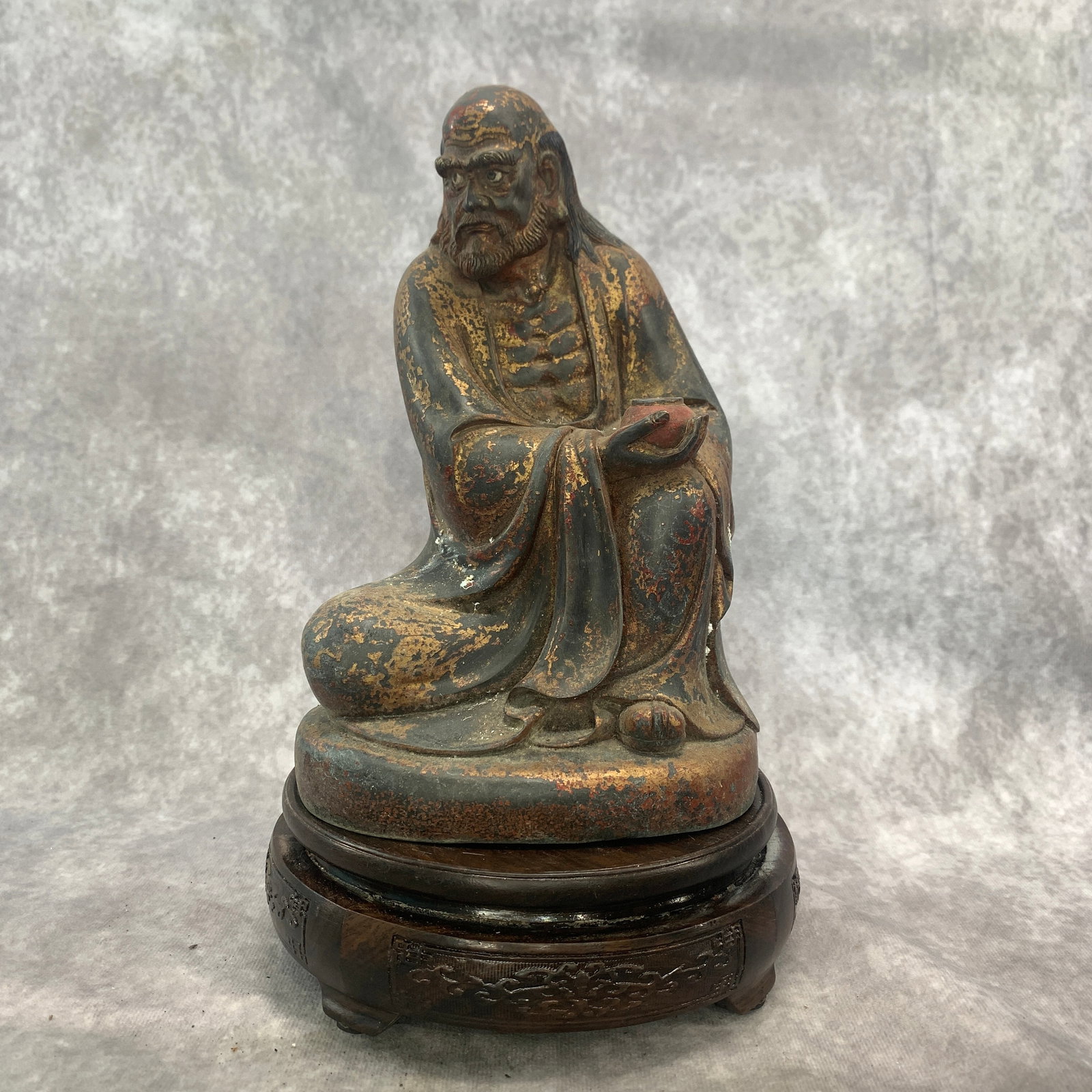 A FINE BRONZE SEATED ARHAT (DISCIPLINE OF BUDDHA): 20th Century; Long: 5.7 inch; Width: 4.5 inch; High: 8.5 inch; Wooden base for diplay only