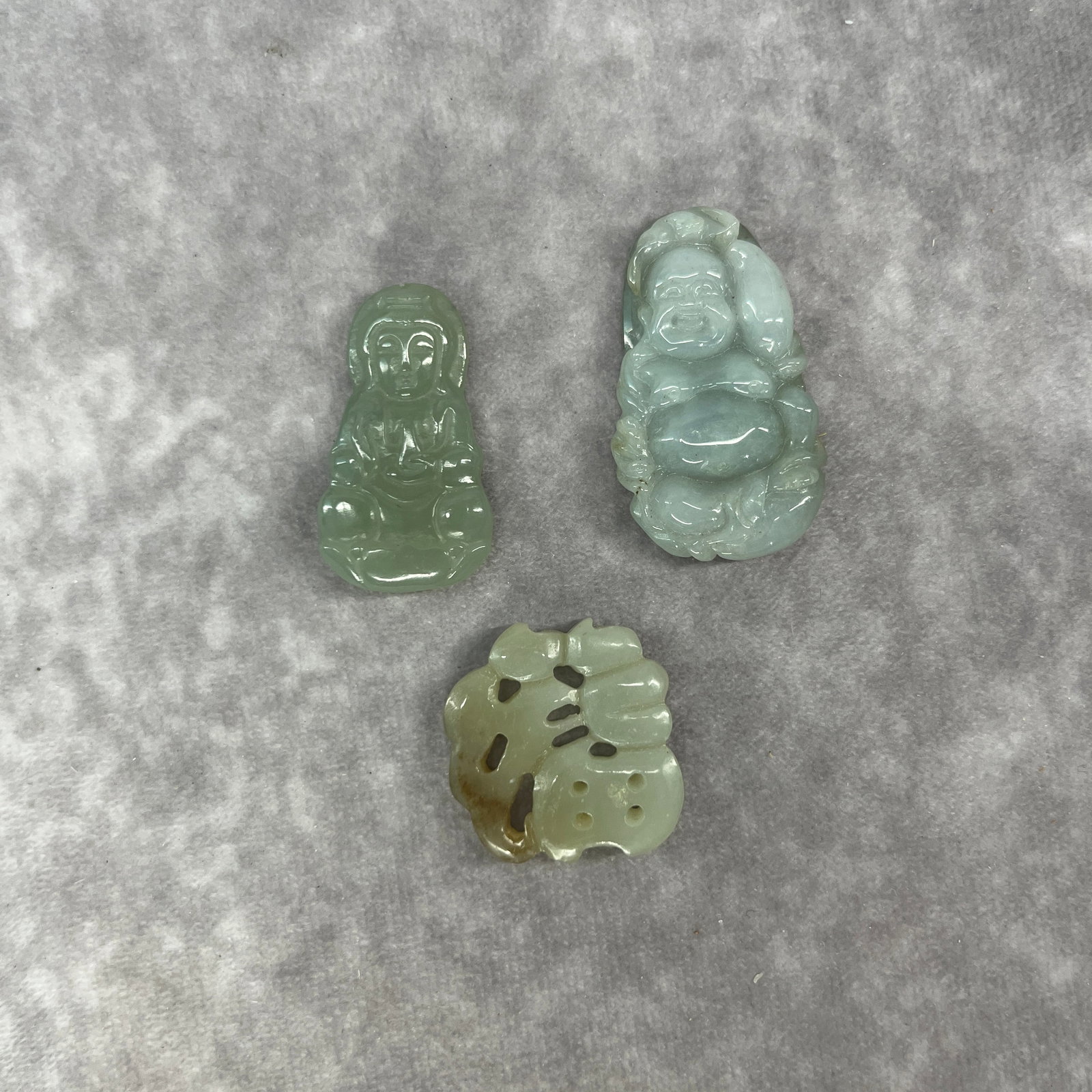 GROUP OF THREE HAND CARVED HETIAN JADE PENDANT