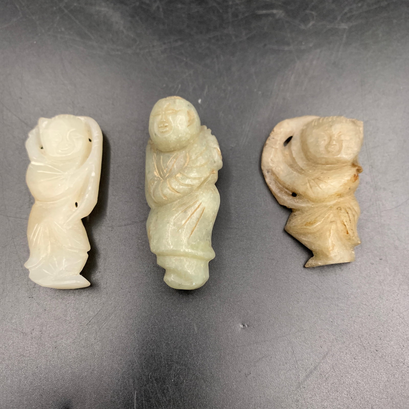 GROUP OF THREE HETIAN JADE PENDANT
