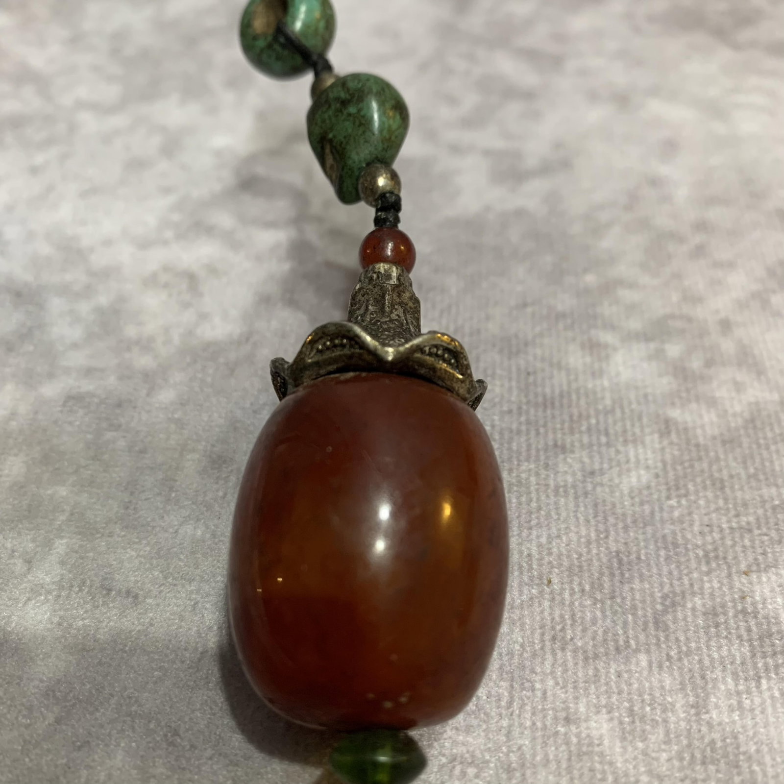 A FINE BEESWAX MADE PENDANT - 2