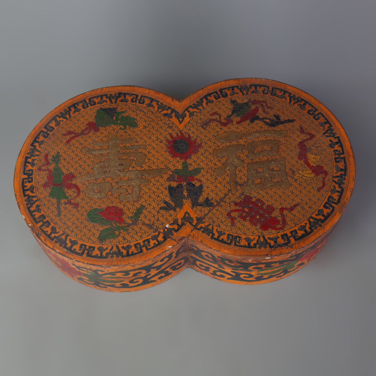 A BLACK LACQUER GILT “LONGEVITY AND BLESSING?? COVERED BOX: Qing Dynasty; Long: 12.1 inch; Width: 7.4 inch; High: 2.9 inch; Wooden base for diplay only