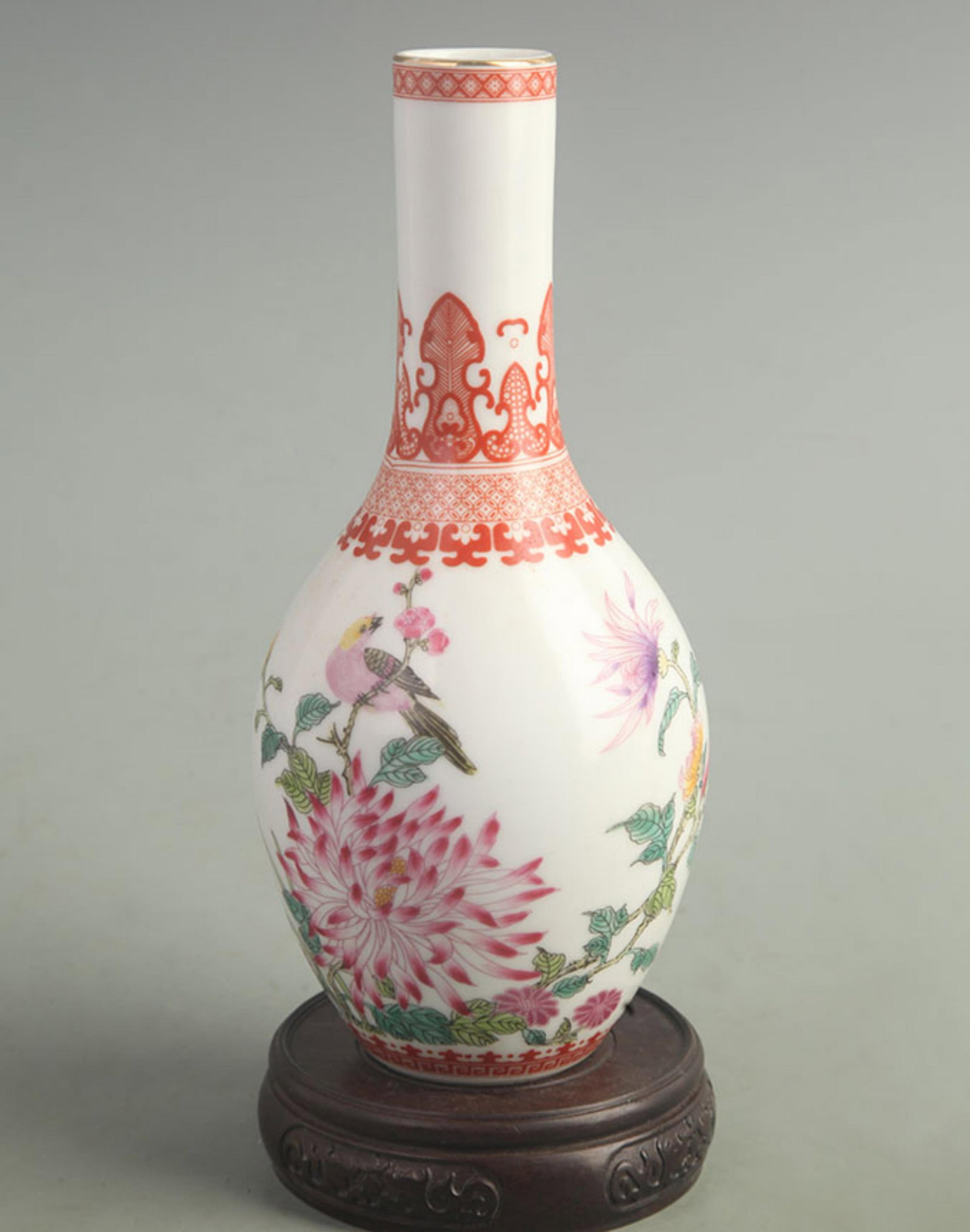 FAMILLE ROSE ENAMEL CHRYSANTHEMUM AND FLYING SWALLOW LONG-NECKED VASE: Qing Dynasty Yong Zheng Period; High: 8.50 inch; Width: 3.50 inch; Wooden base for diplay only