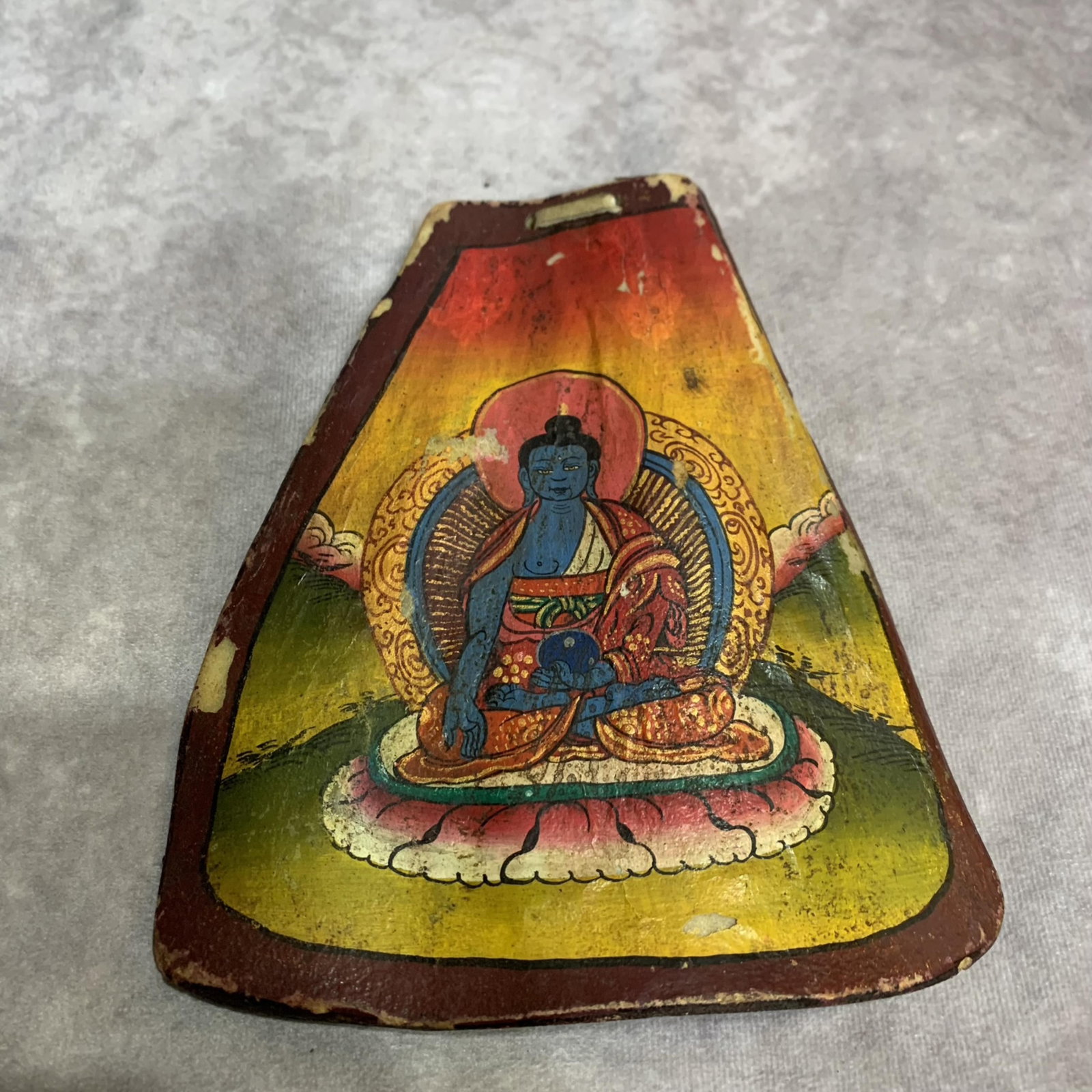 A TIBETAN BUDDHIST PAINTING ON OX BONE